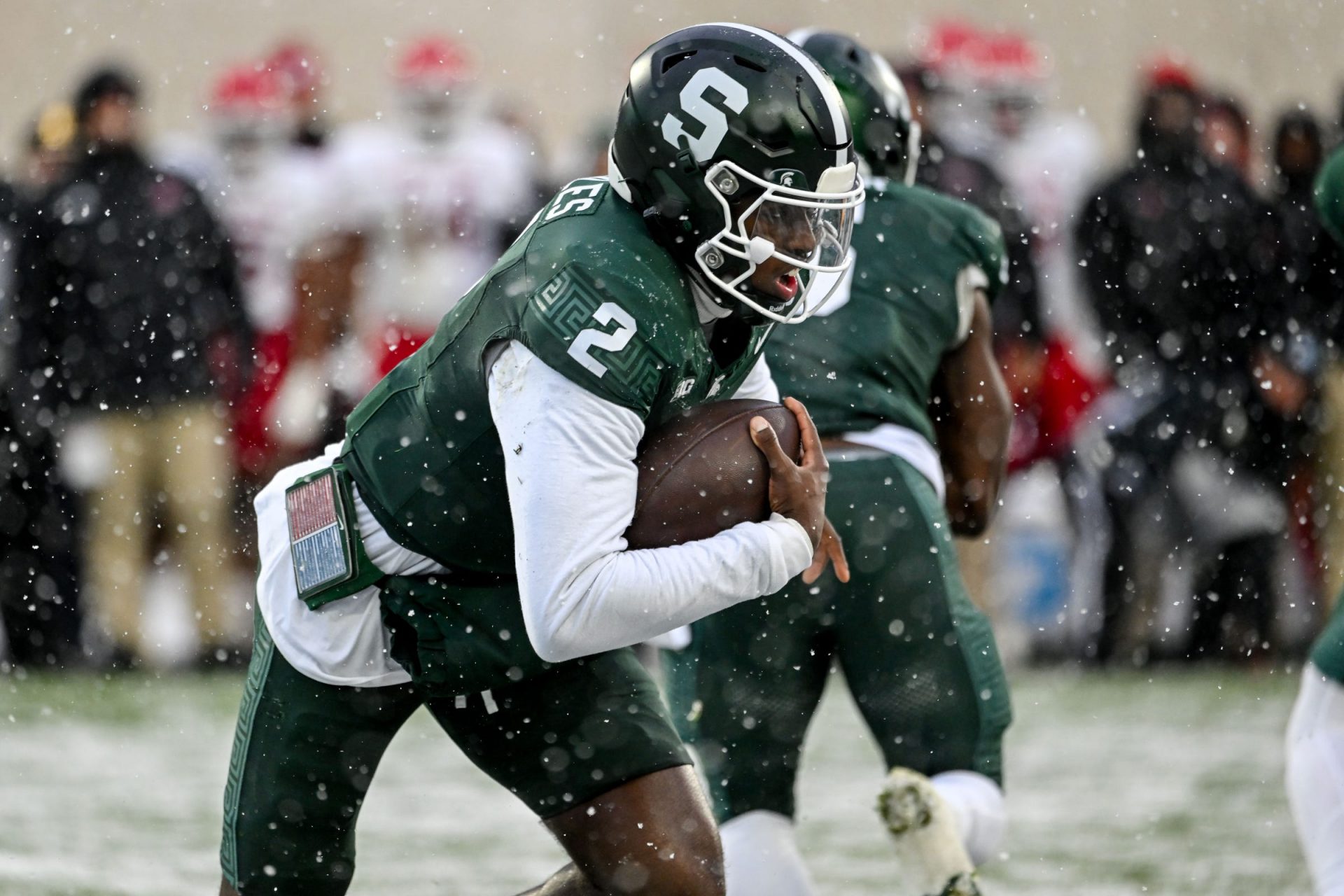 Michigan State's Aidan Chiles runs the ball against Rutgers during the first quarter on Saturday, Nov. 30, 2024, at Spartan Stadium in East Lansing.
