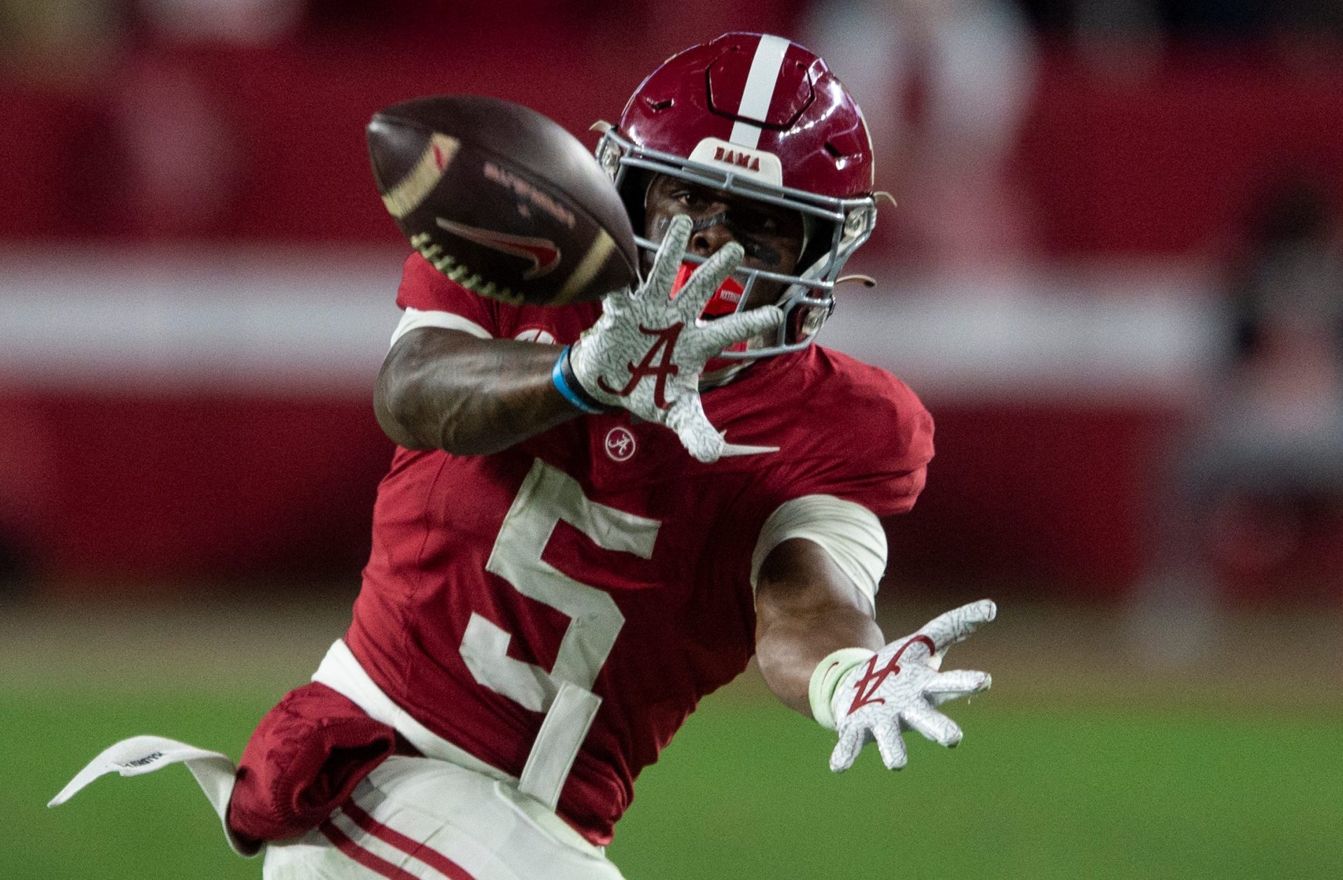 Alabama Crimson Tide wide receiver Germie Bernard (5) catches a pass as Auburn Tigers take on Alabama Crimson Tide at Bryant-Denny Stadium in Tuscaloosa, Ala., on Saturday, Nov. 30, 2024. Alabama Crimson Tide defeated Auburn Tigers 28-14.