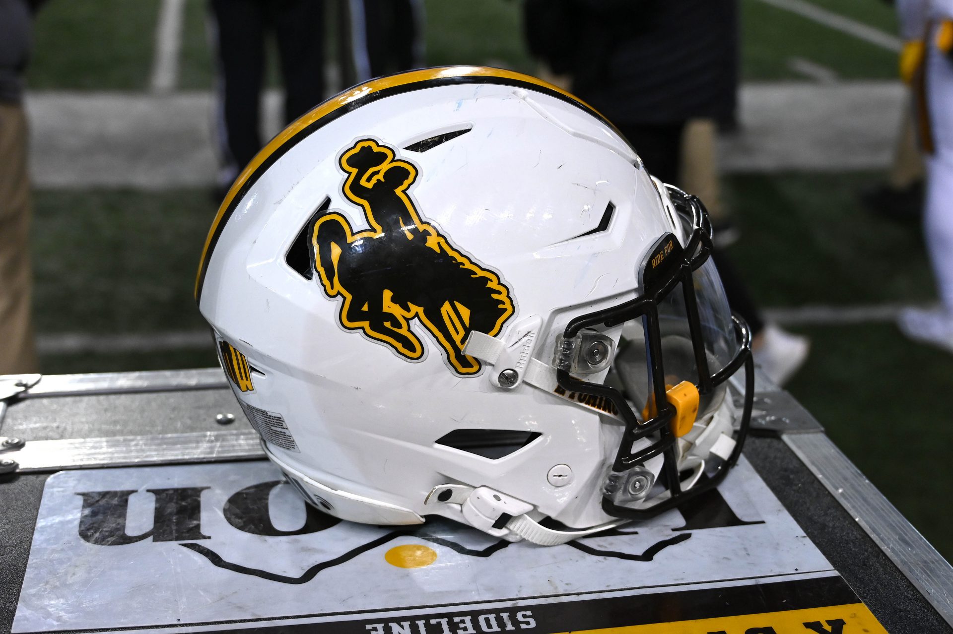 Wyoming Cowboys helmet sits during a game against the Washington State Cougars in the first half at Gesa Field at Martin Stadium.