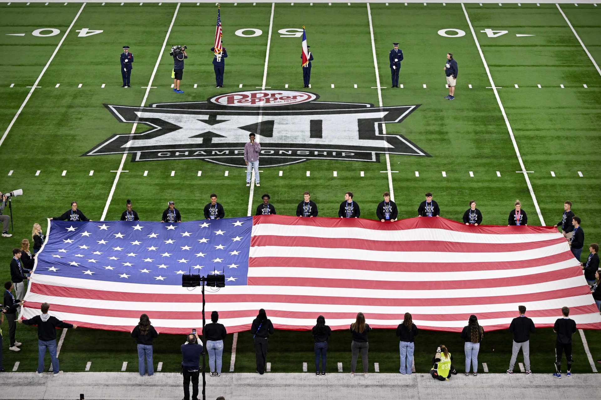 A view of the Big 12 logo and American flag before the game between the Iowa State Cyclones and the Arizona State Sun Devils at AT&T Stadium.