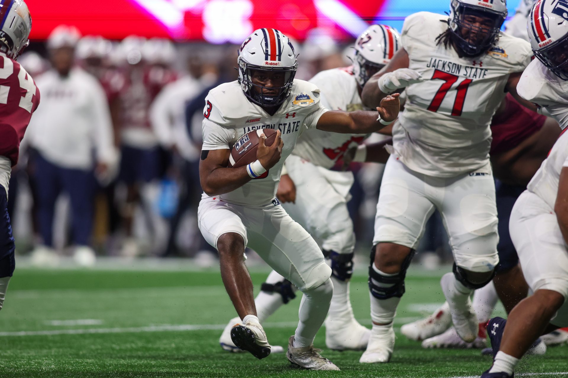 Jackson State Tigers quarterback Zy McDonald (3) runs the ball against the South Carolina State Bulldogs in the third quarter at Mercedes-Benz Stadium.