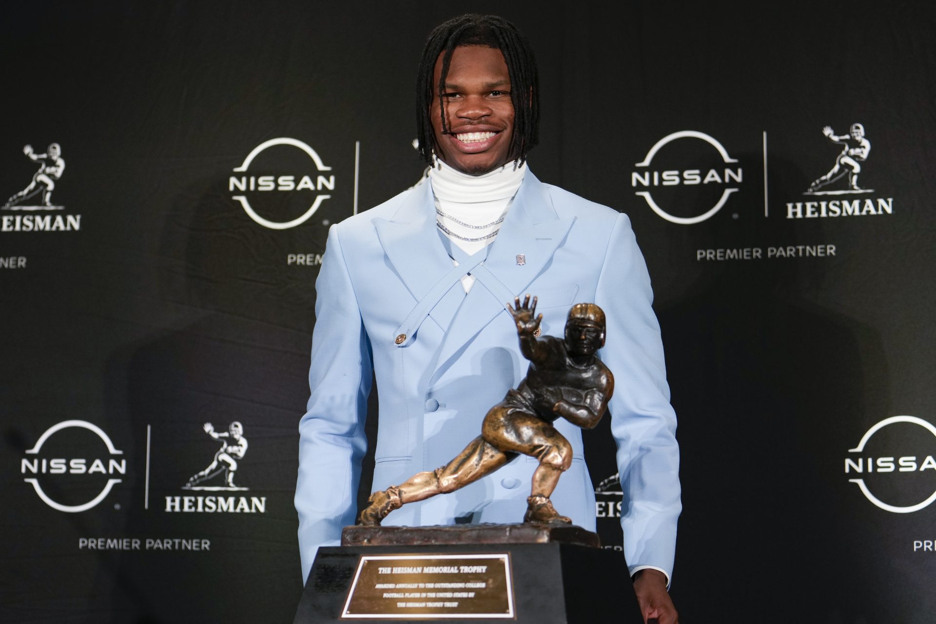 Colorado Buffaloes wide receiver/cornerback Travis Hunter poses for a photo during a press conference before the 2024 Heisman Trophy Presentation.