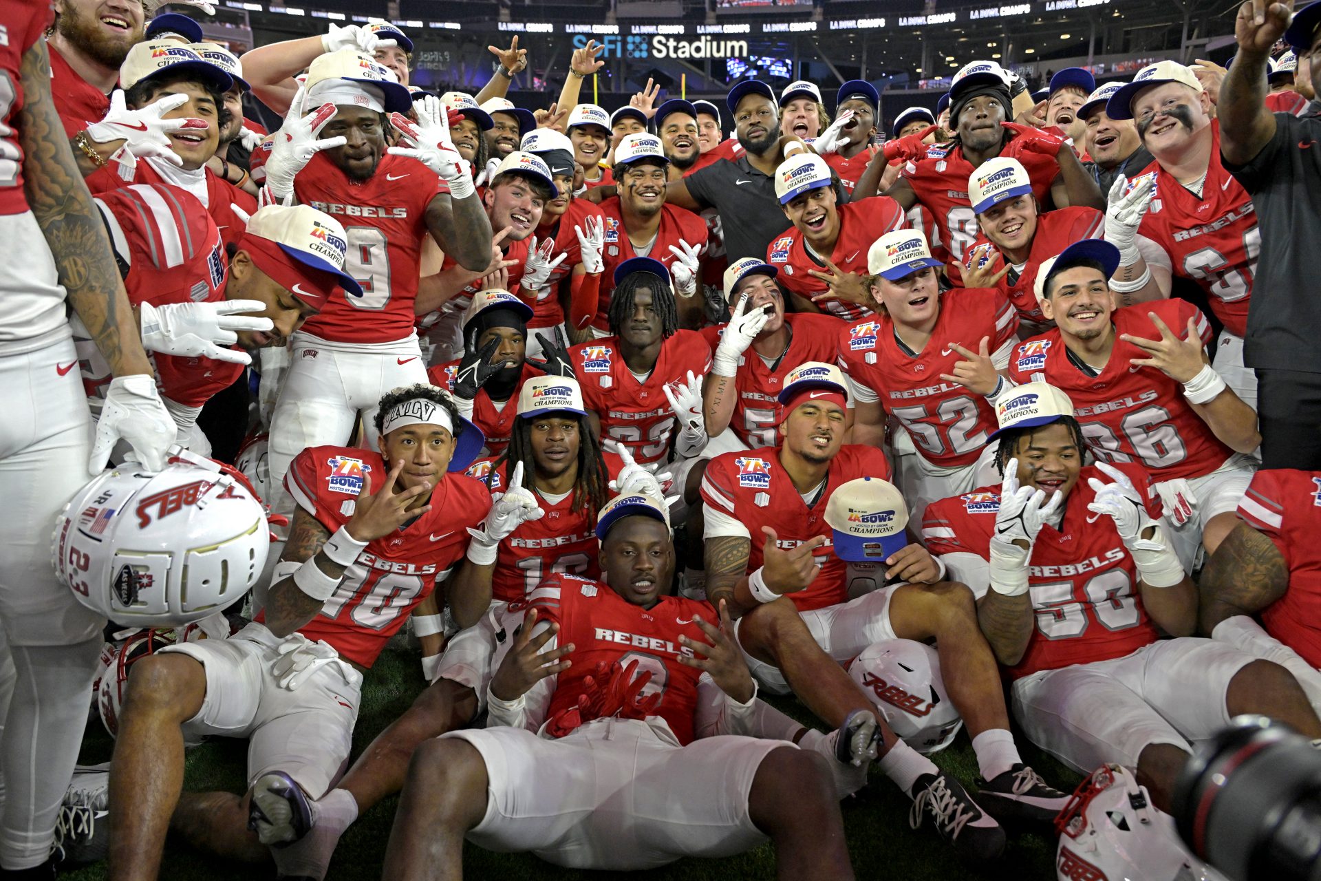 The UNLV Rebels celebrate after defeating the California Golden Bears in the LA Bowl at SoFi Stadium.