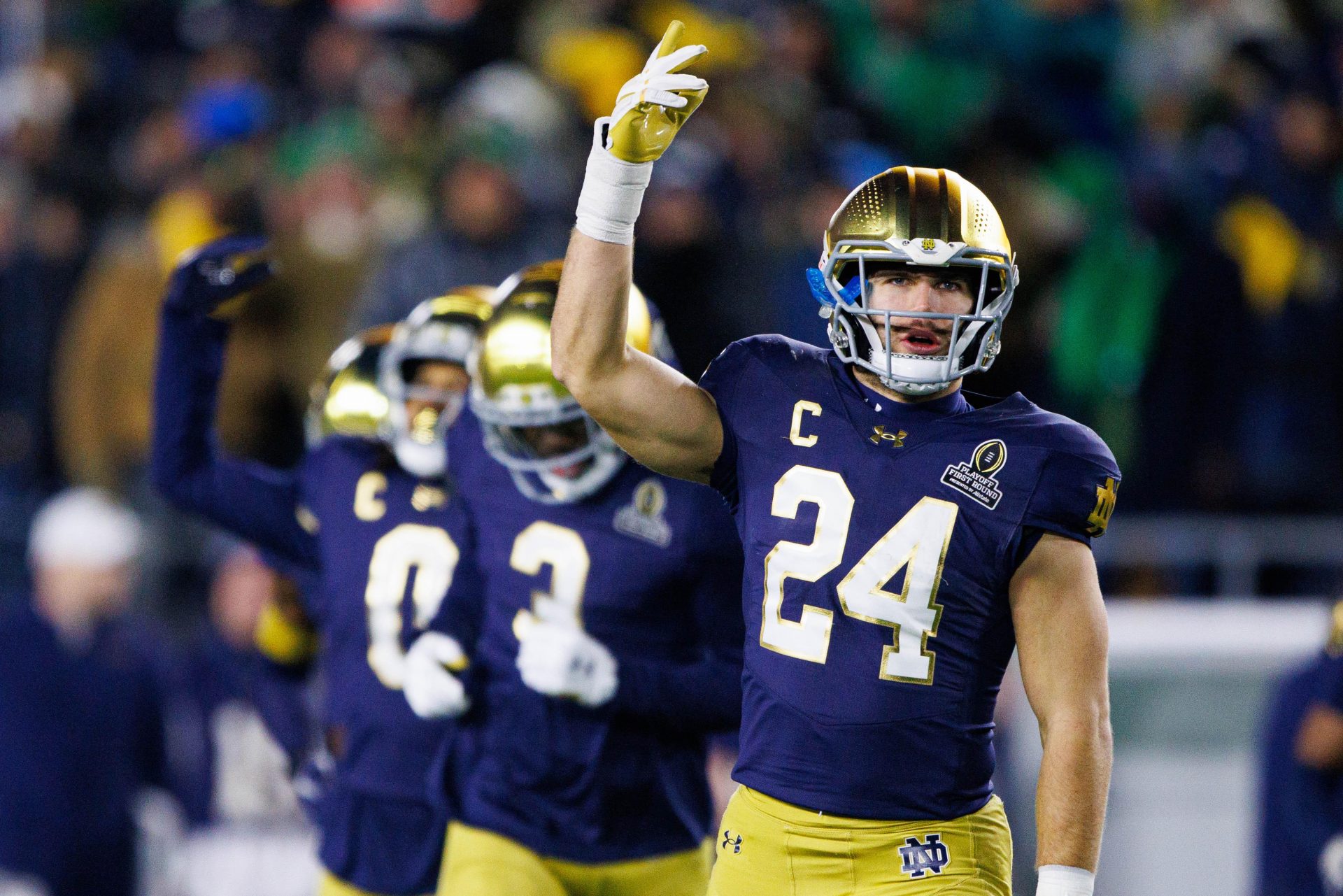 Notre Dame linebacker Jack Kiser (24) hypes up the crowd during the first round of the College Football Playoff between Notre Dame and Indiana at Notre Dame Stadium on Friday, Dec. 20, 2024, in South Bend.