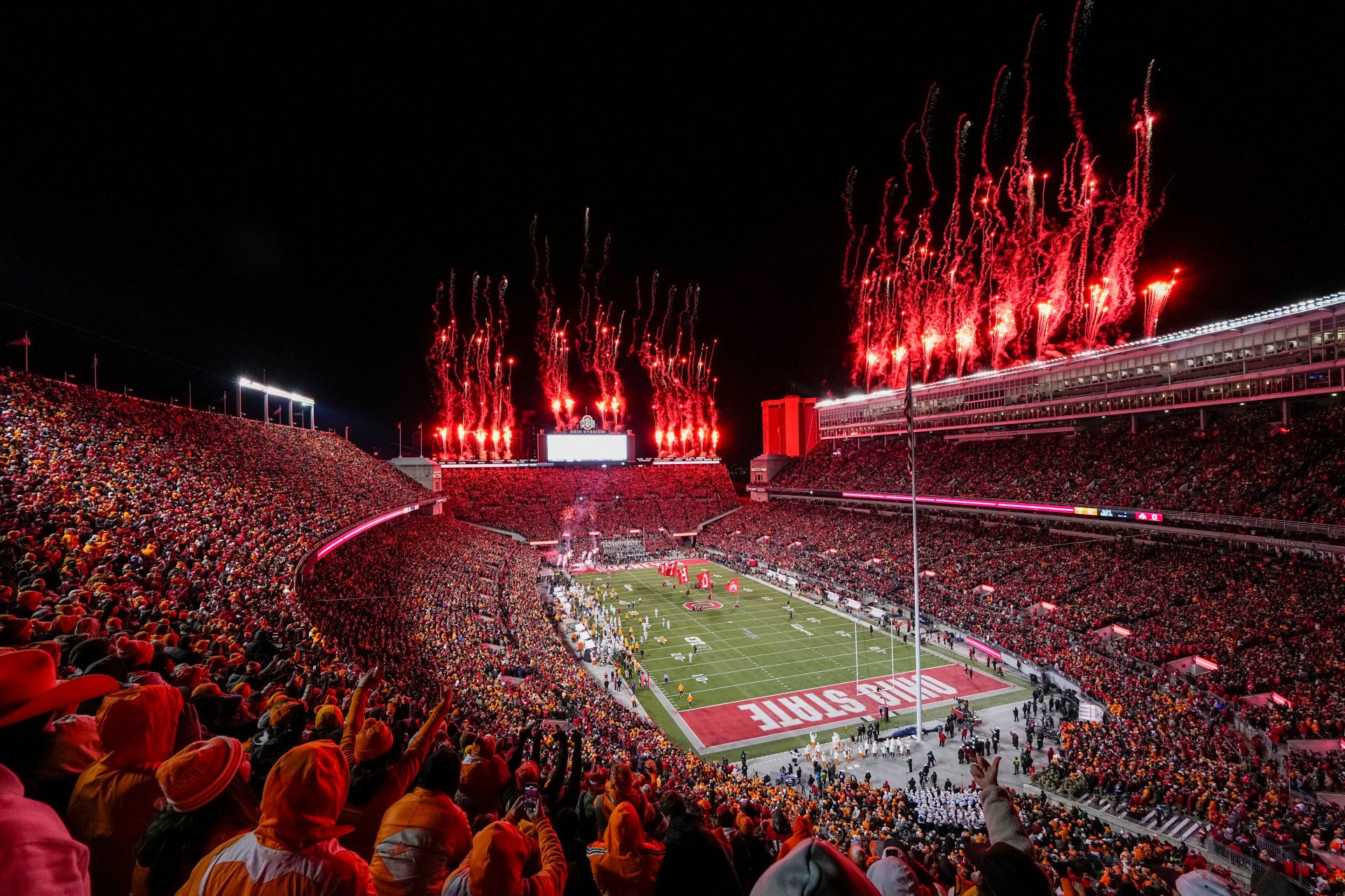 Fireworks erupt as the Ohio State Buckeyes take the field prior to the College Football Playoff first round game against the Tennessee Volunteers at Ohio Stadium in Columbus on Dec. 21, 2024.