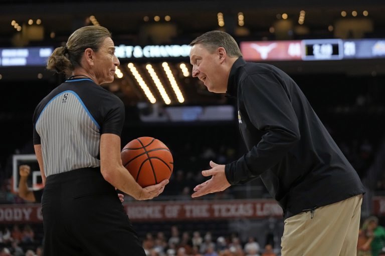 South Dakota State Jackrabbits head coach Aaron Johnston challenges a call from an official during the first half against the Texas Longhorns at Moody Center.