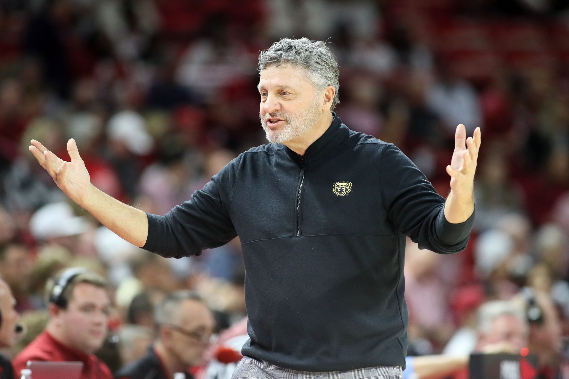 Oakland Golden Grizzlies head coach Greg Kampe during the first half against the Arkansas Razorbacks at Bud Walton Arena.