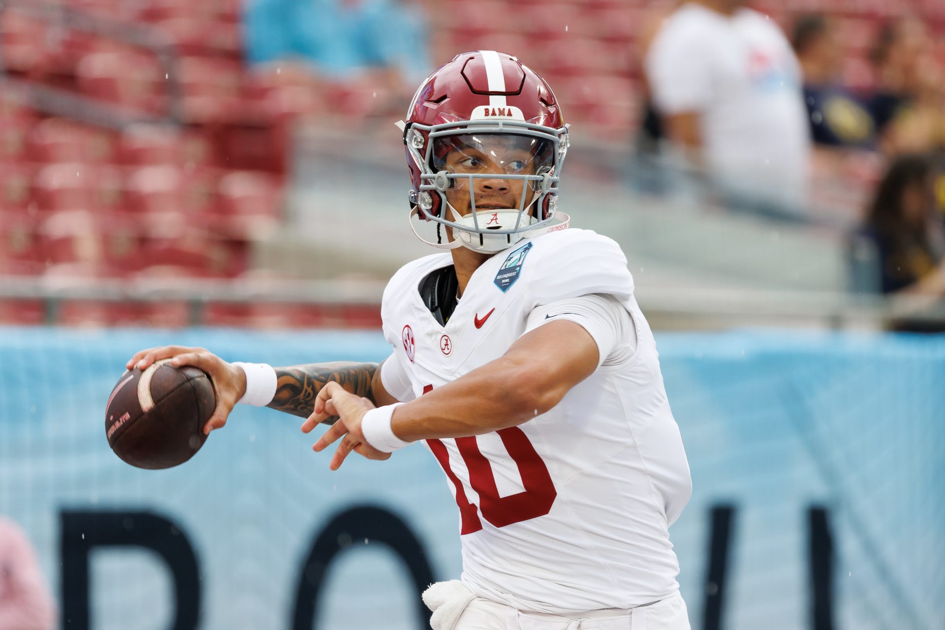 Alabama Crimson Tide quarterback Austin Mack (10) throws the ball before a game against the Michigan Wolverines at Raymond James Stadium.