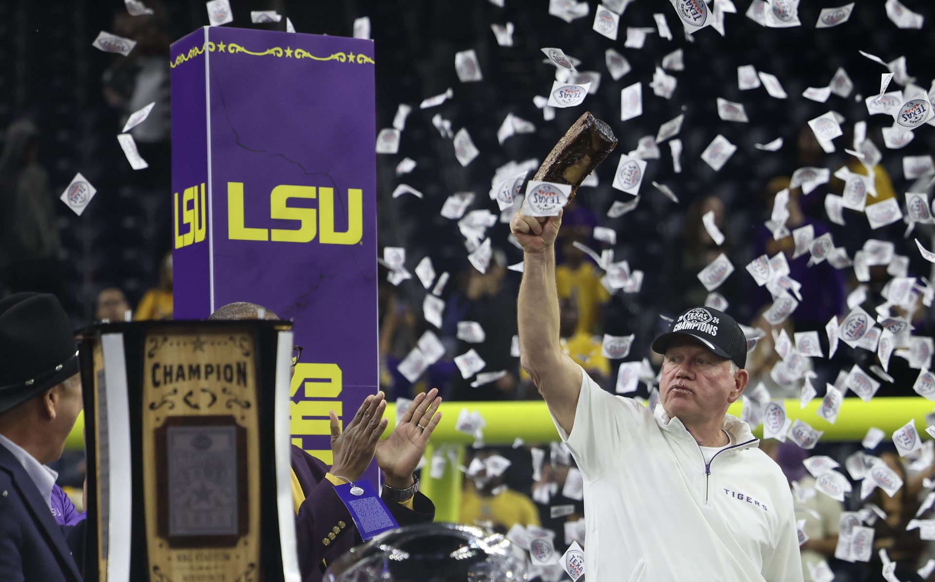 LSU Tigers head coach Brian Kelly celebrates after defeating the Baylor Bears in the Kinder’s Texas Bowl in the second half at NRG Stadium.