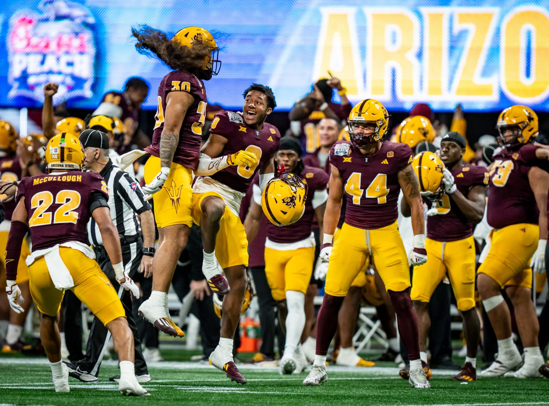 Arizona State celebrate their comeback in the fourth quarter as the Texas Longhorns play the Arizona State Sun Devils in the Peach Bowl College Football Playoff quarterfinal at Mercedes-Benz Stadium in Atlanta, Georgia, Jan. 1, 2025.