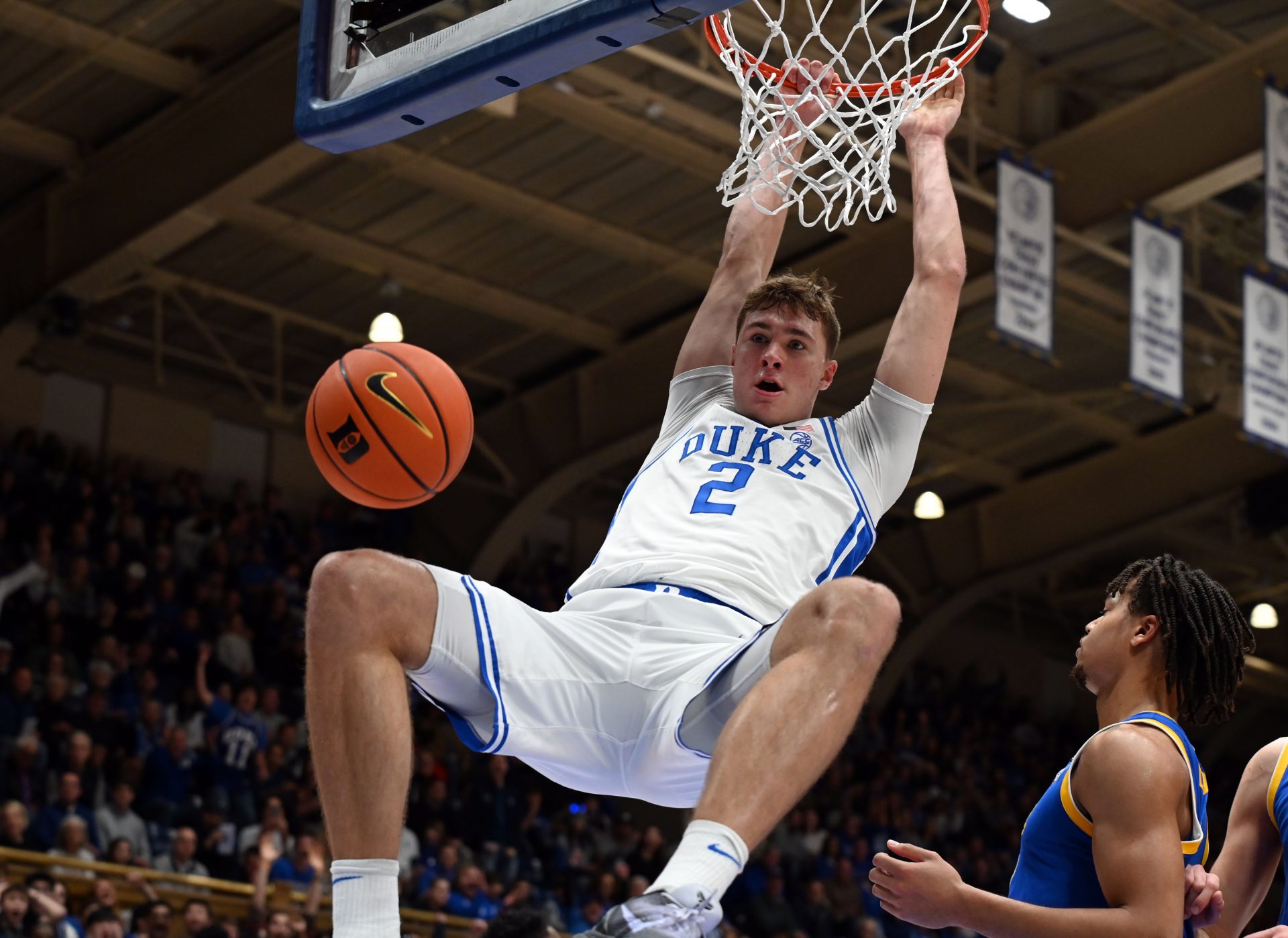 Duke Blue Devils forward Cooper Flagg (2) dunks during the second half against the Pitt Panthers at Cameron Indoor Stadium.
