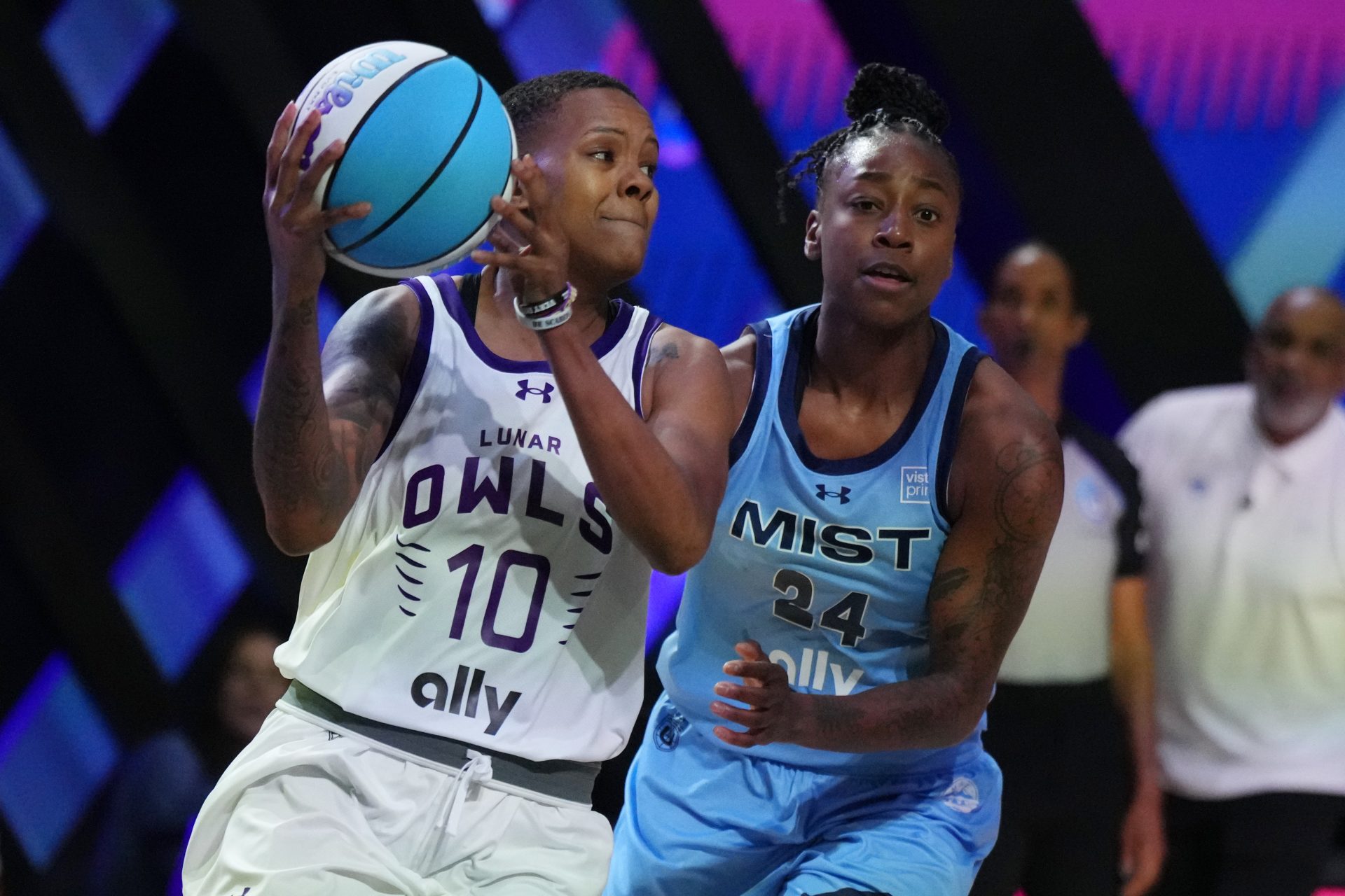 Courtney Williams (10) of the Lunar Owls looks to pass the ball as Jewell Loyd (24) of the Mist follows on the play during the first half of the Unrivaled women’s professional 3v3 basketball league at Wayfair Arena.