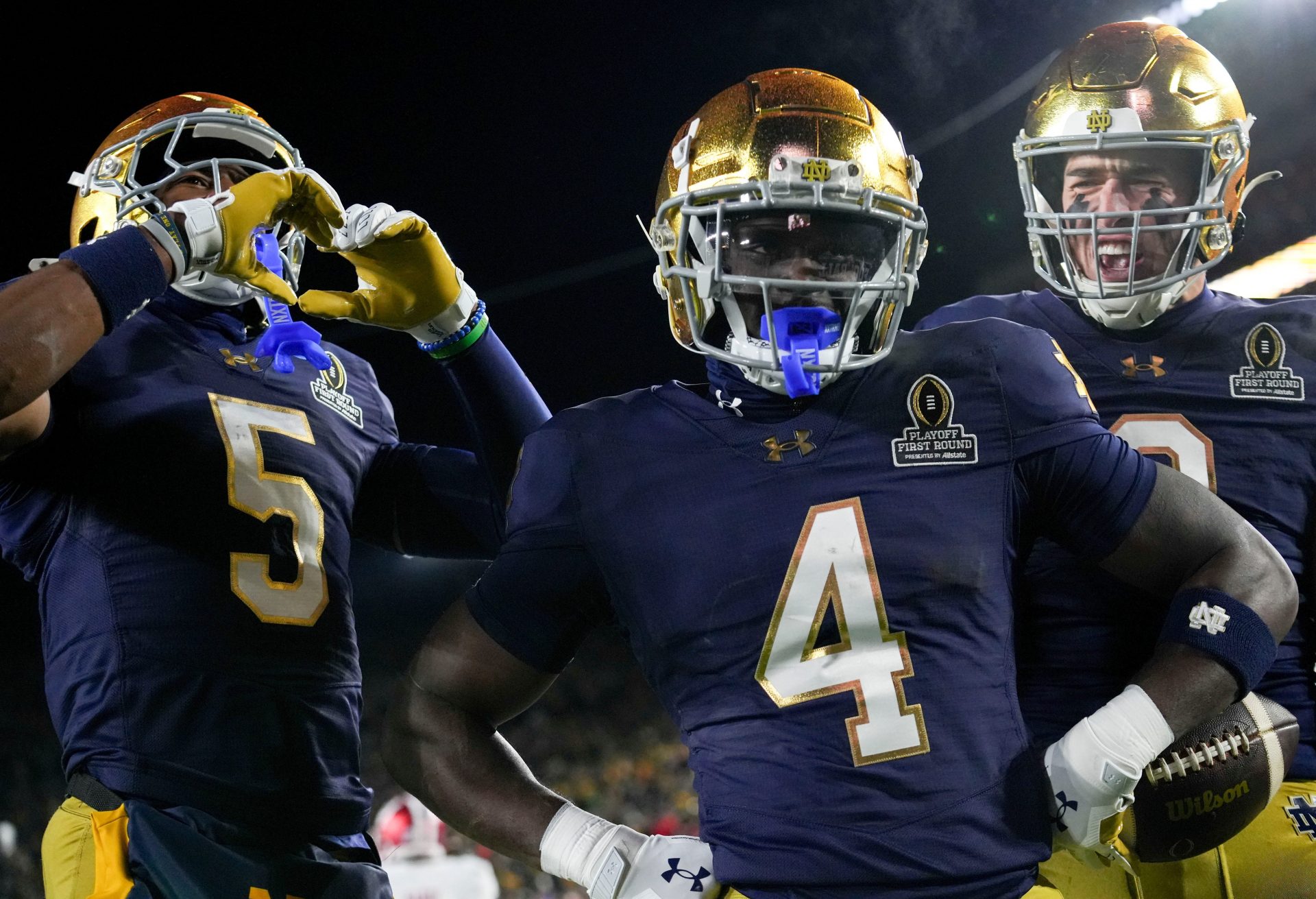 Notre Dame Fighting Irish running back Jeremiyah Love (4) celebrates after scoring a touchdown during the first half of a game between the Indiana Hoosiers and the Notre Dame Fighting Irish in first round of the College Football Playoff on Friday, Dec. 20, 2024, in South Bend.