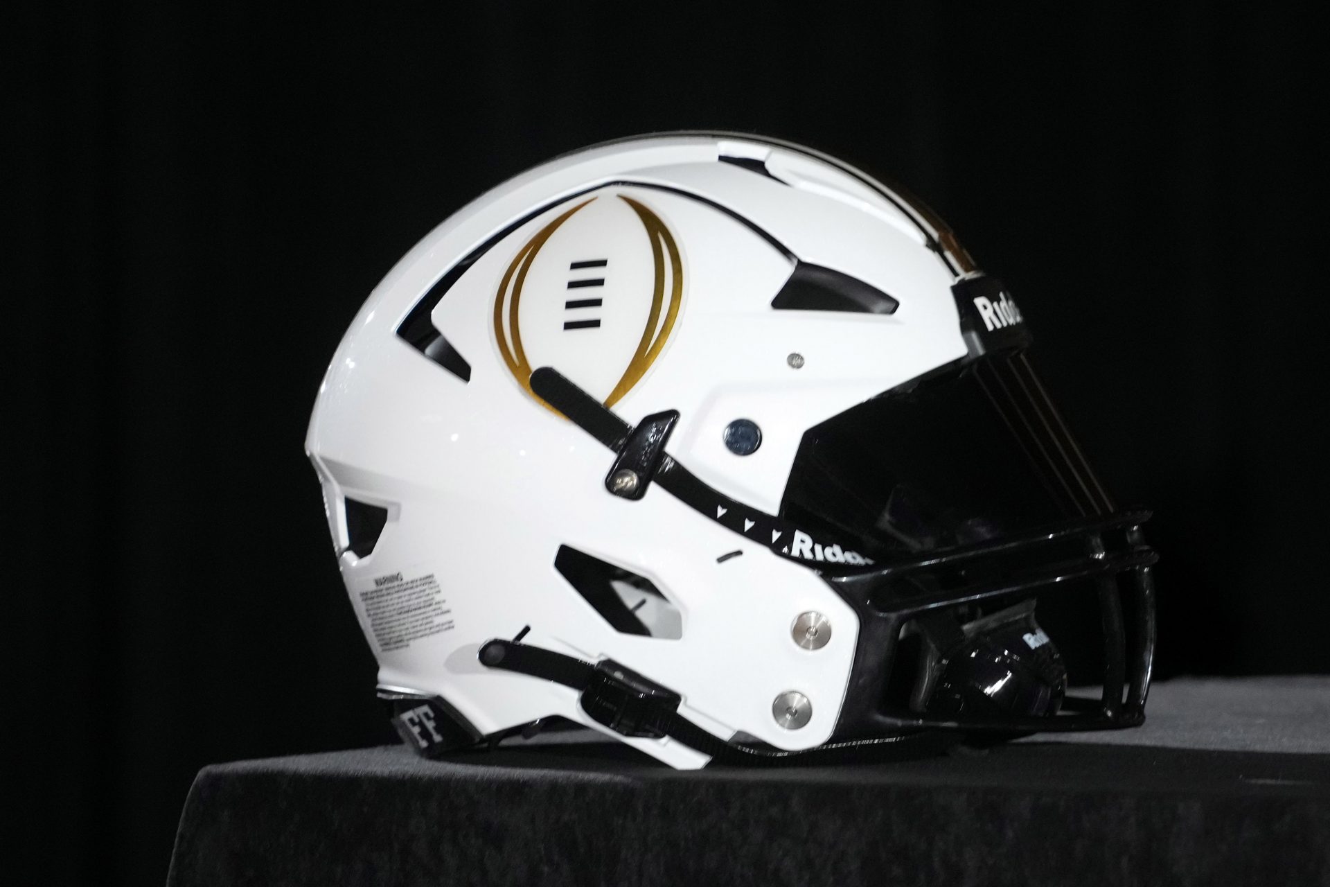 A College Football Playoff logo helmet at a press conference at The Westin Peachtree Plaza, Savannah Ballroom.