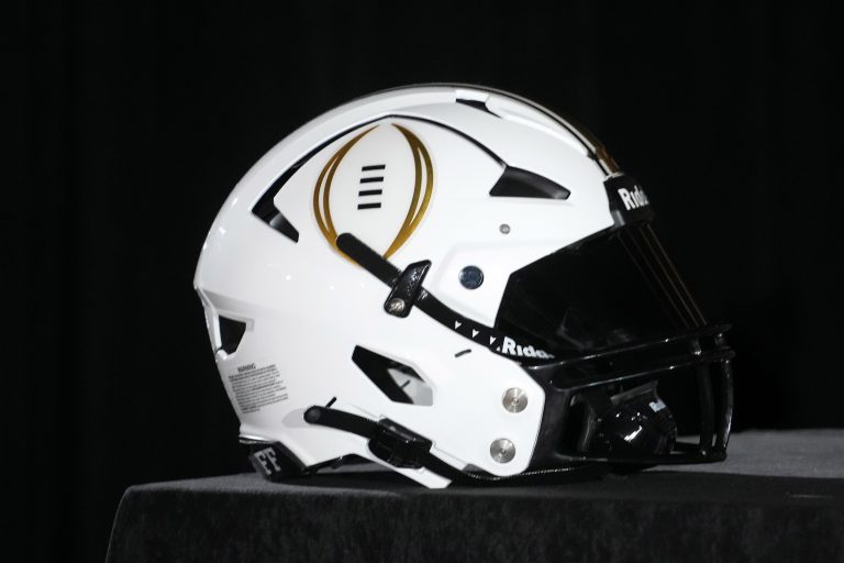 A College Football Playoff logo helmet at a press conference at The Westin Peachtree Plaza, Savannah Ballroom.