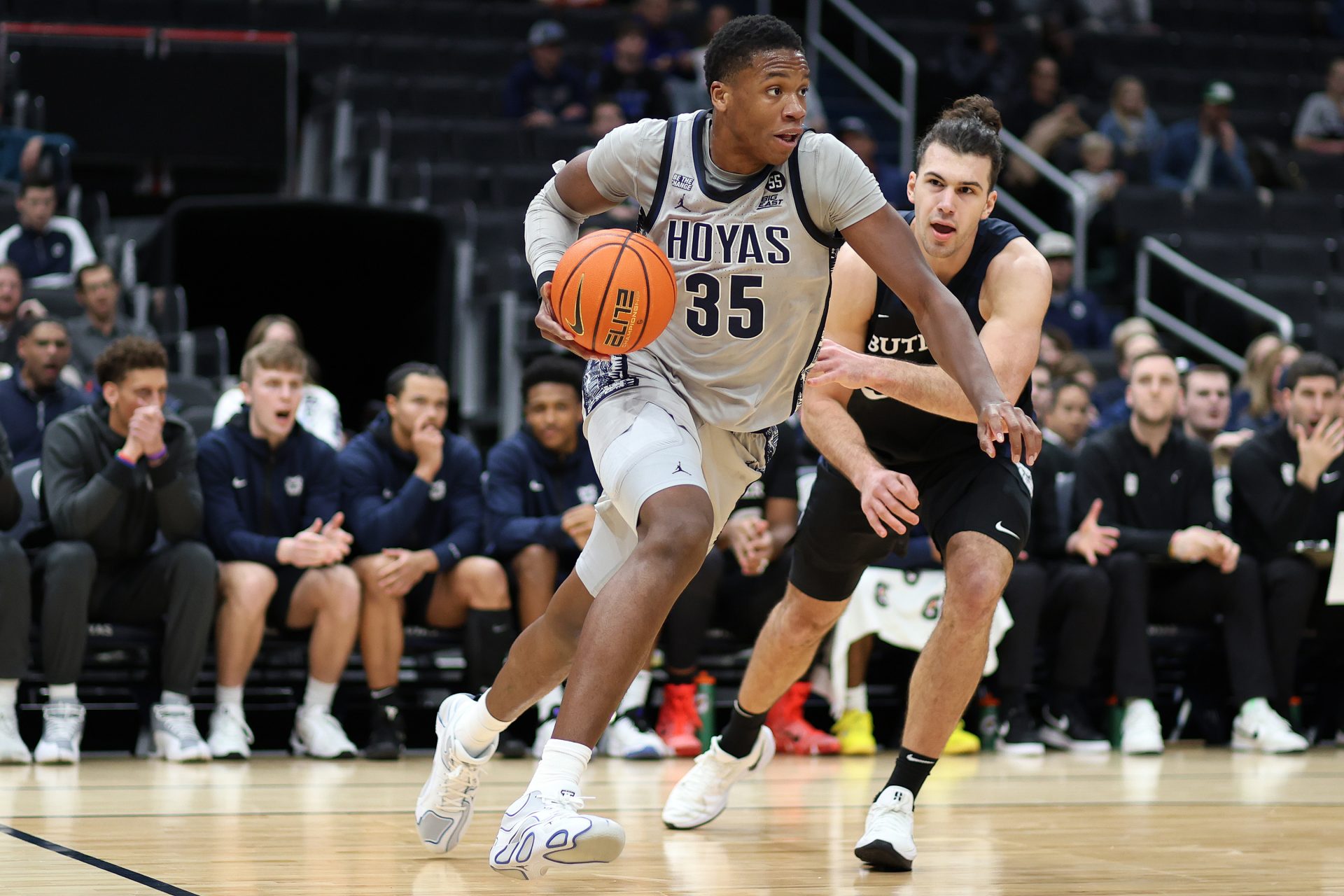 Georgetown Hoyas forward Thomas Sorber (35) drives past Butler Bulldogs forward Boden Kapke (33) during the first half at Capital One Arena.