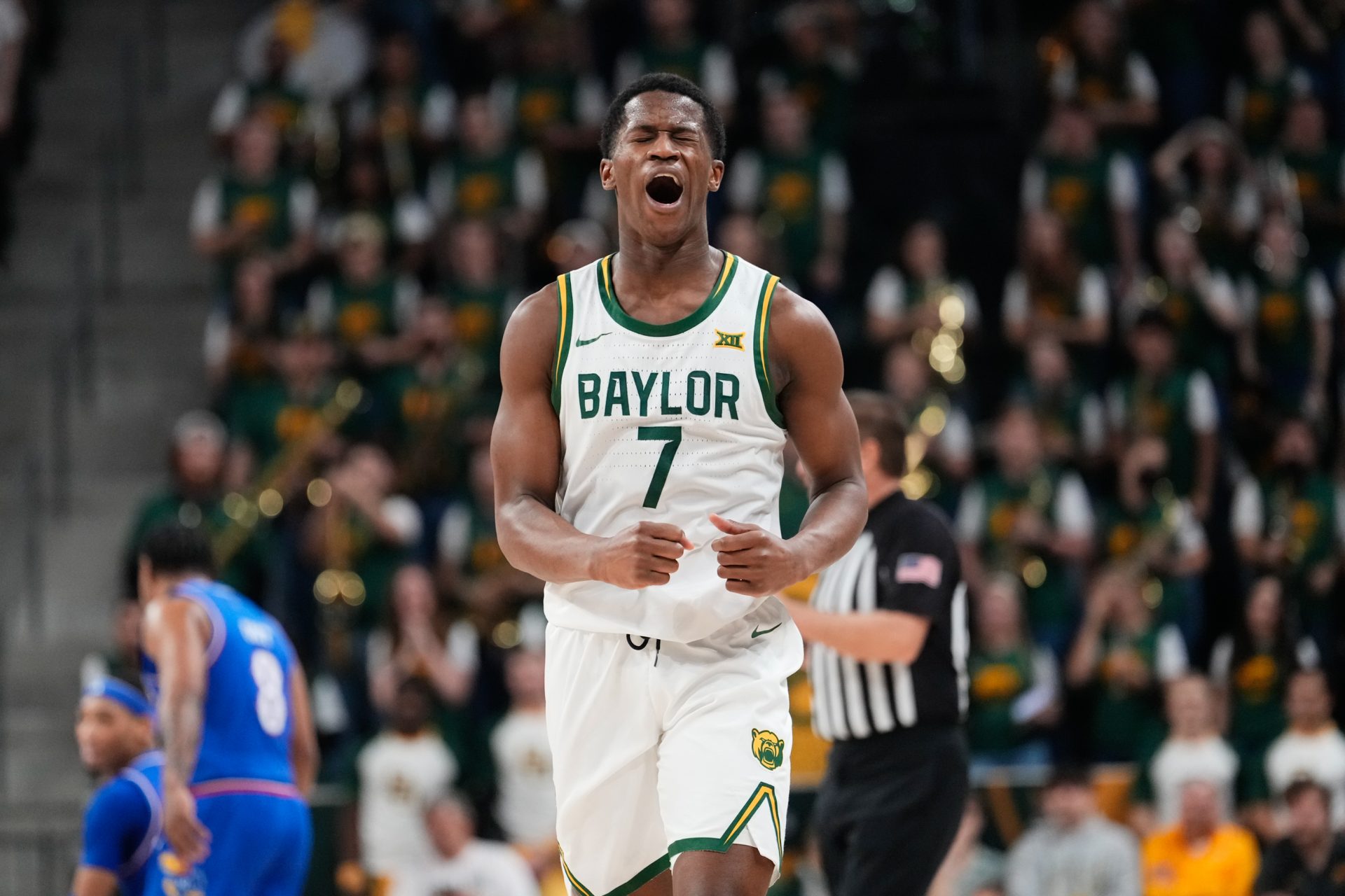 Baylor Bears guard VJ Edgecombe (7) reacts after committing a turnover against the Kansas Jayhawks during the first half at Paul and Alejandra Foster Pavilion.