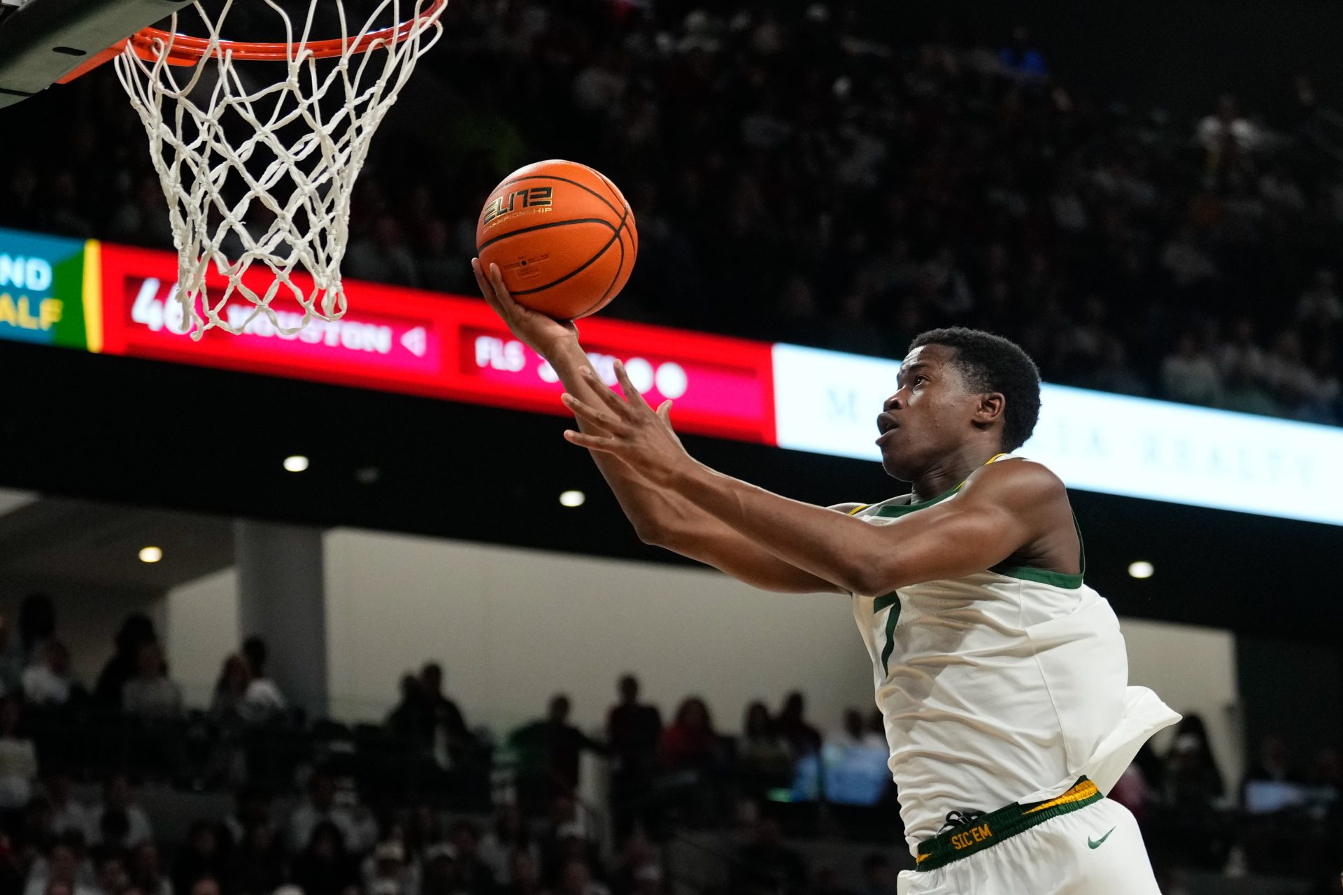Baylor Bears guard VJ Edgecombe (7) scores a layup against the Houston Cougars during the second half at Paul and Alejandra Foster Pavilion.