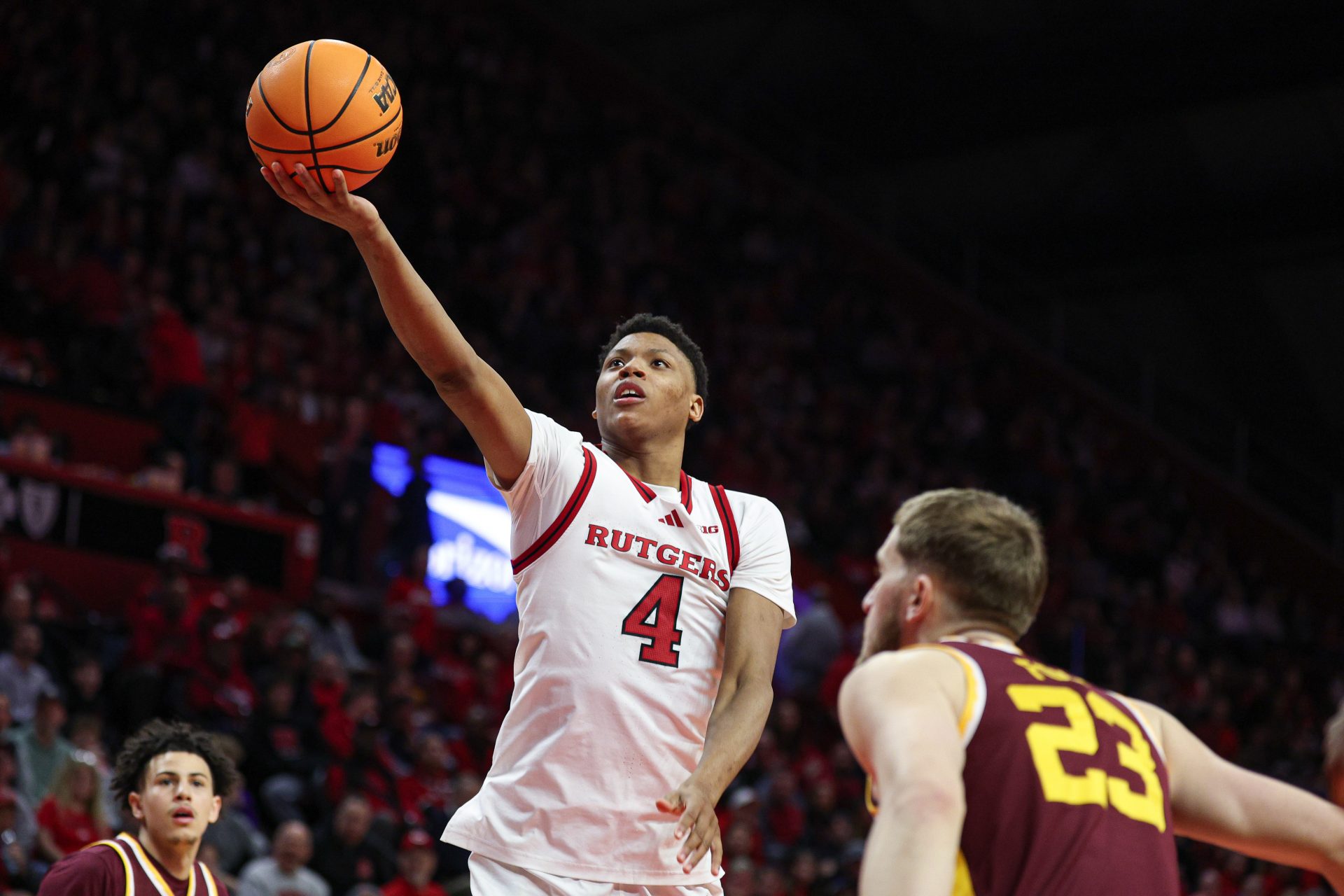 Rutgers Scarlet Knights guard Ace Bailey (4) goes to the basket during the second half against Minnesota Golden Gophers forward Parker Fox (23) at Jersey Mike's Arena.