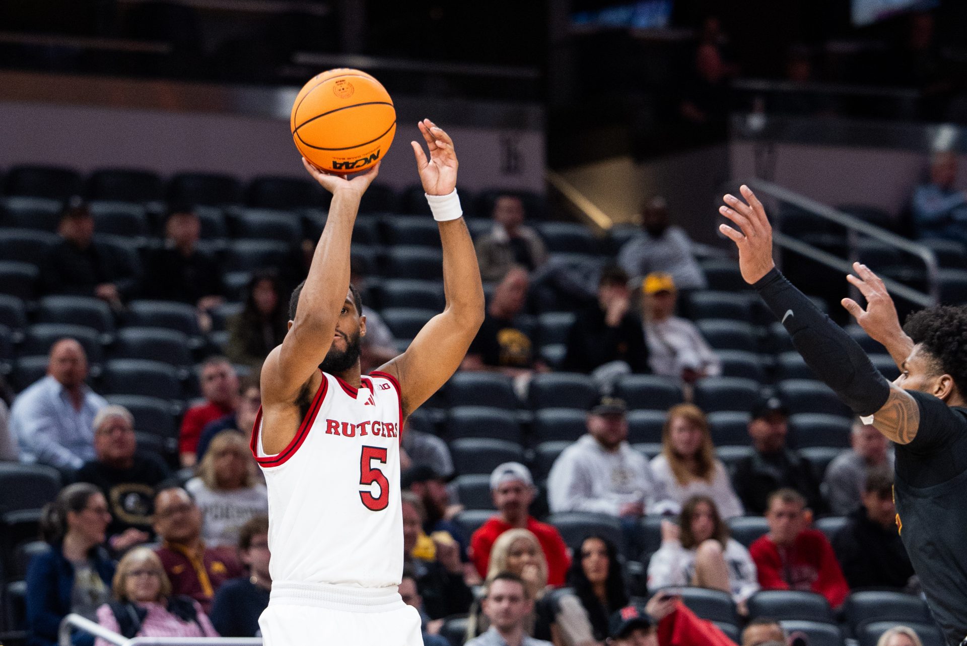 Rutgers Scarlet Knights guard Tyson Acuff (5) shoots the ball in the second half against the USC Trojans at Gainbridge Fieldhouse.