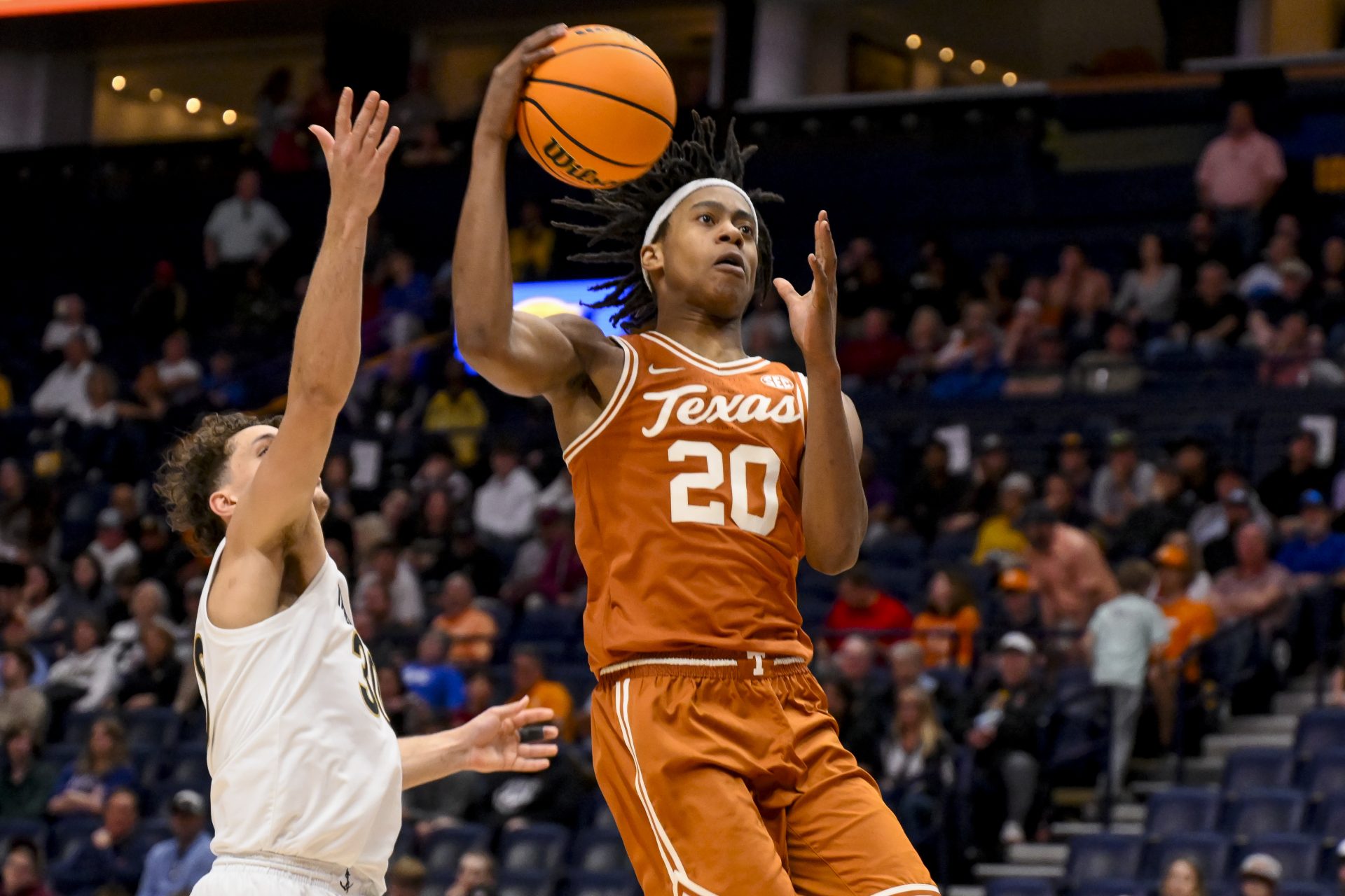 Texas Longhorns guard Tre Johnson (20) lays the ball in against the Vanderbilt Commodores during the second half at Bridgestone Arena.
