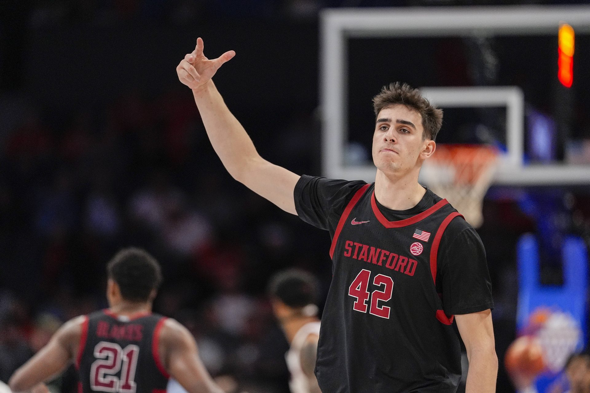 Stanford Cardinal forward Maxime Raynaud (42) after a dunk against the Louisville Cardinals during the second half at Spectrum Center.