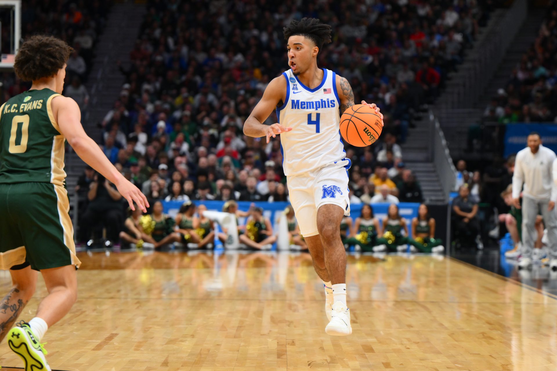 Memphis Tigers guard PJ Haggerty (4) drives the ball during the second half against Colorado State Rams at Climate Pledge Arena.