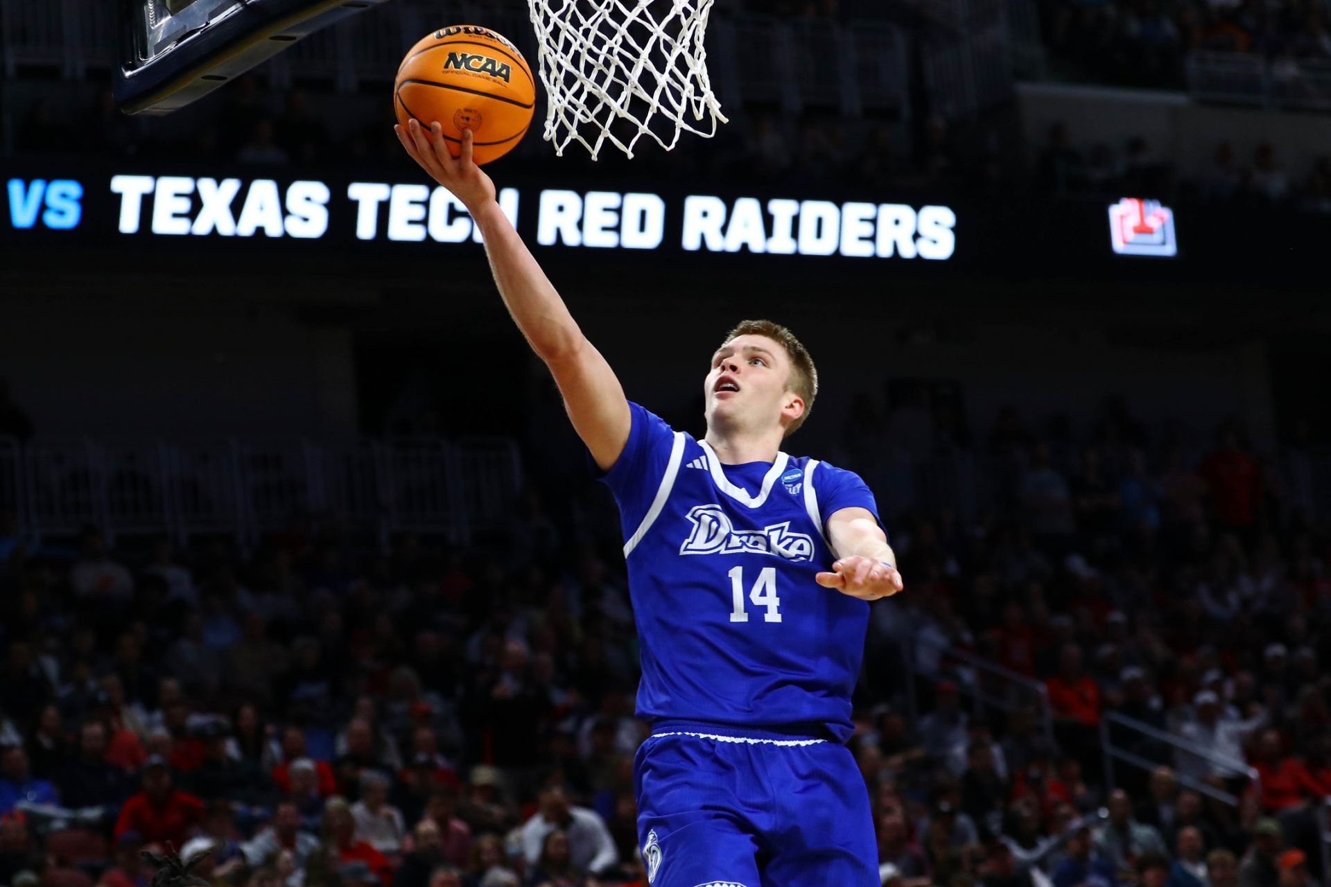 Drake Bulldogs guard Bennett Stirtz (14) shoots the ball against the Texas Tech Red Raiders during the second half at Intrust Bank Arena.