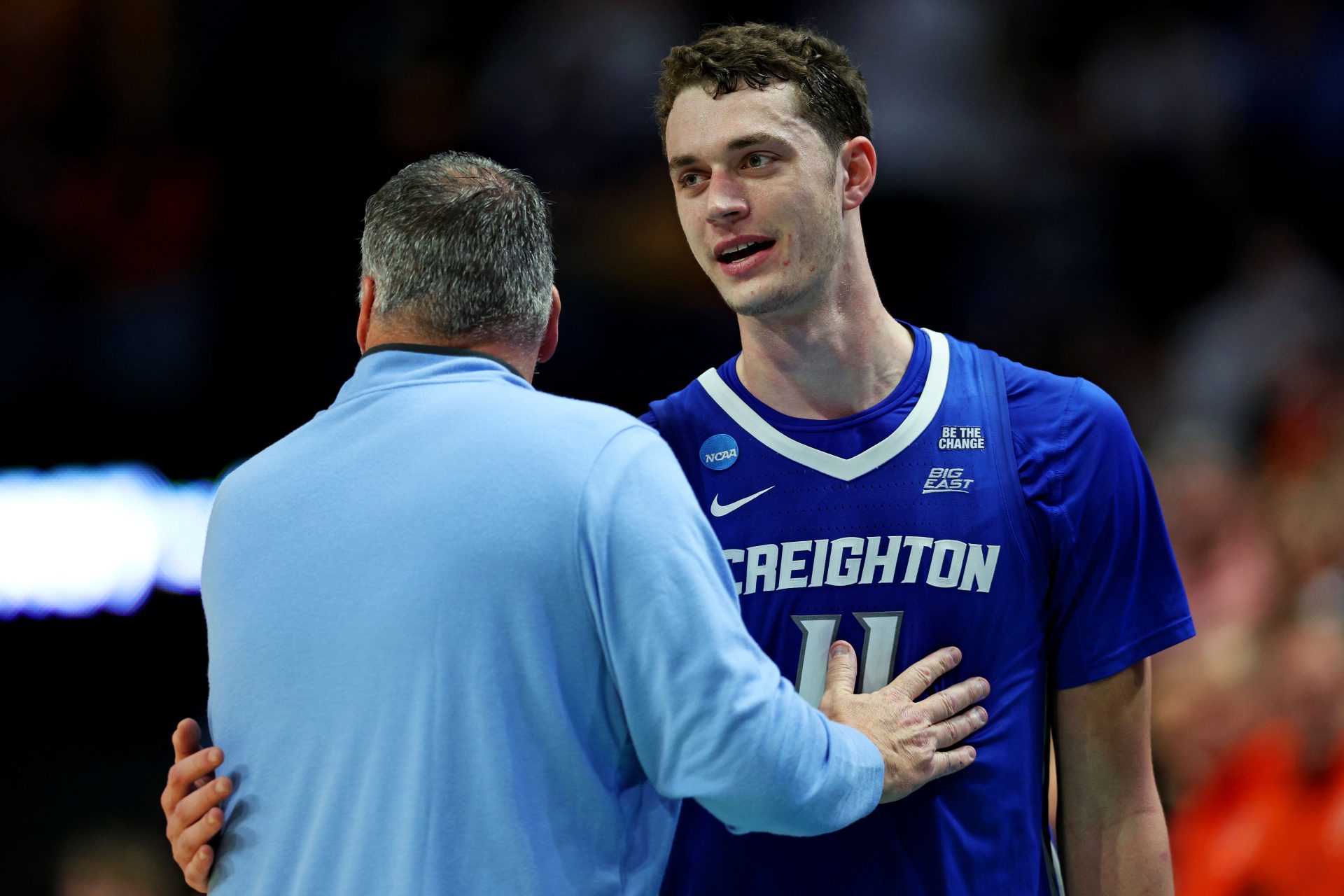 Creighton Bluejays center Ryan Kalkbrenner (11) reacts with head coach Greg McDermott during the second half against the Auburn Tigers in the second round to the NCAA Tournament at Rupp Arena.