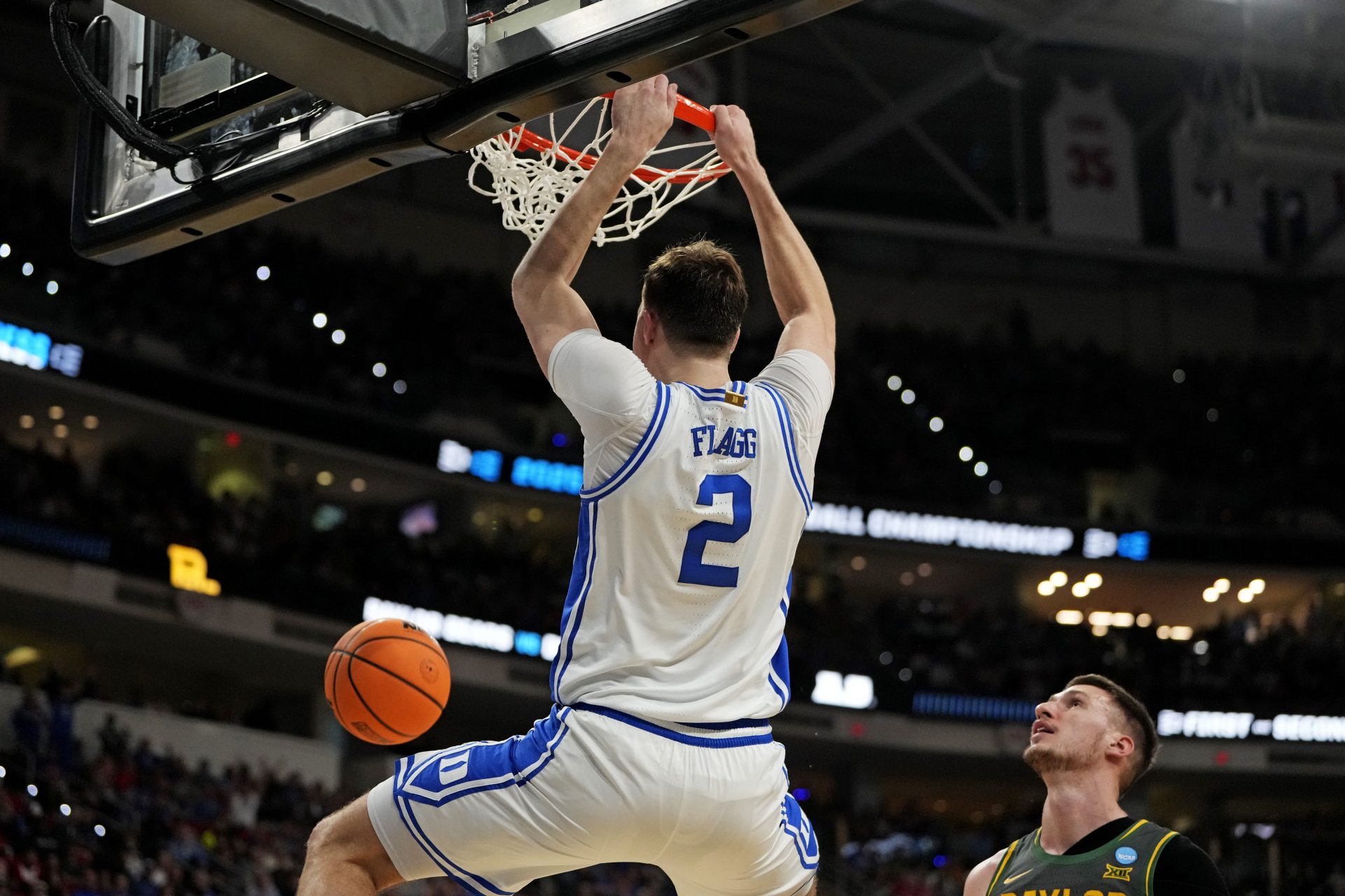Duke Blue Devils forward Cooper Flagg (2) dunks the ball during the first half against the Baylor Bears in the second round of the NCAA Tournament at Lenovo Center.
