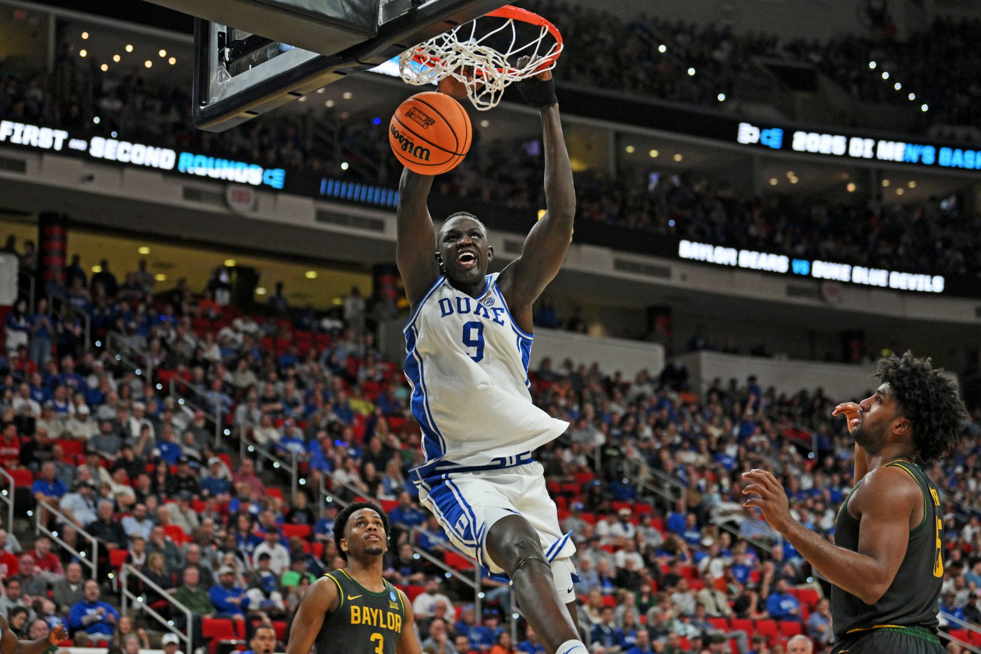 Duke Blue Devils center Khaman Maluach (9) dunks the ball during the second half against the Baylor Bears  in the second round of the NCAA Tournament at Lenovo Center.