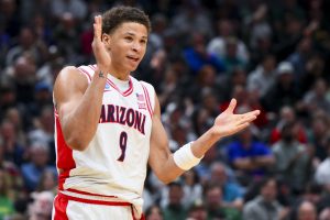 Arizona Wildcats forward Carter Bryant (9) reacts against the Oregon Ducks in the first half at Climate Pledge Arena.