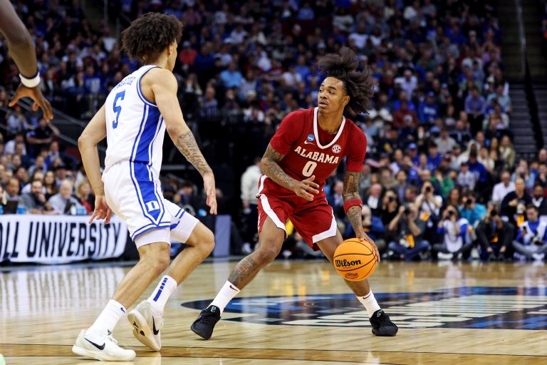 Alabama Crimson Tide guard Labaron Philon (0) handles the ball against Duke Blue Devils guard Tyrese Proctor (5) during the second half in the East Regional final of the 2025 NCAA tournament at Prudential Center.