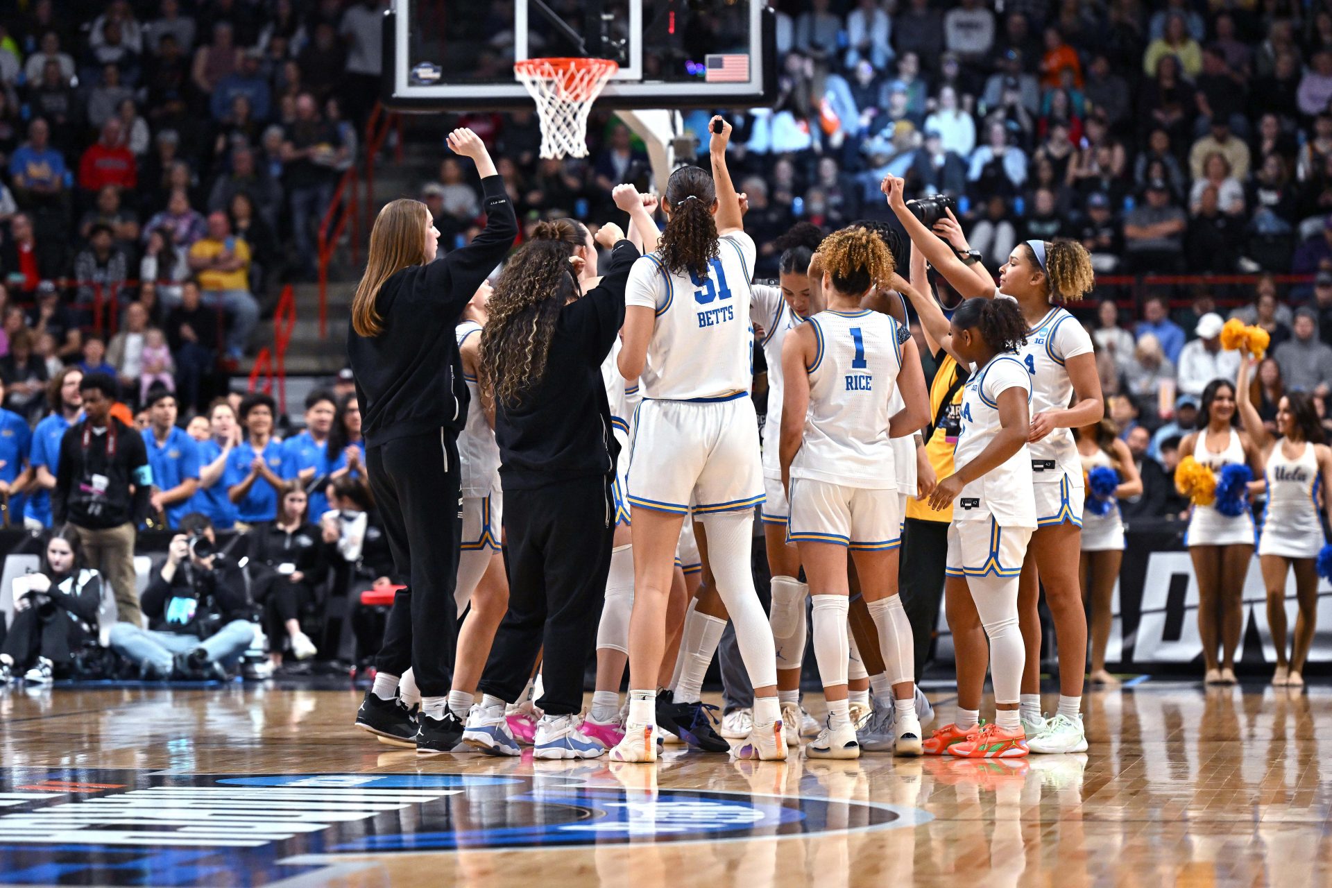 UCLA Bruins huddle during the first half of a Elite 8 NCAA Tournament basketball game against the LSU Lady Tigers at Spokane Arena.