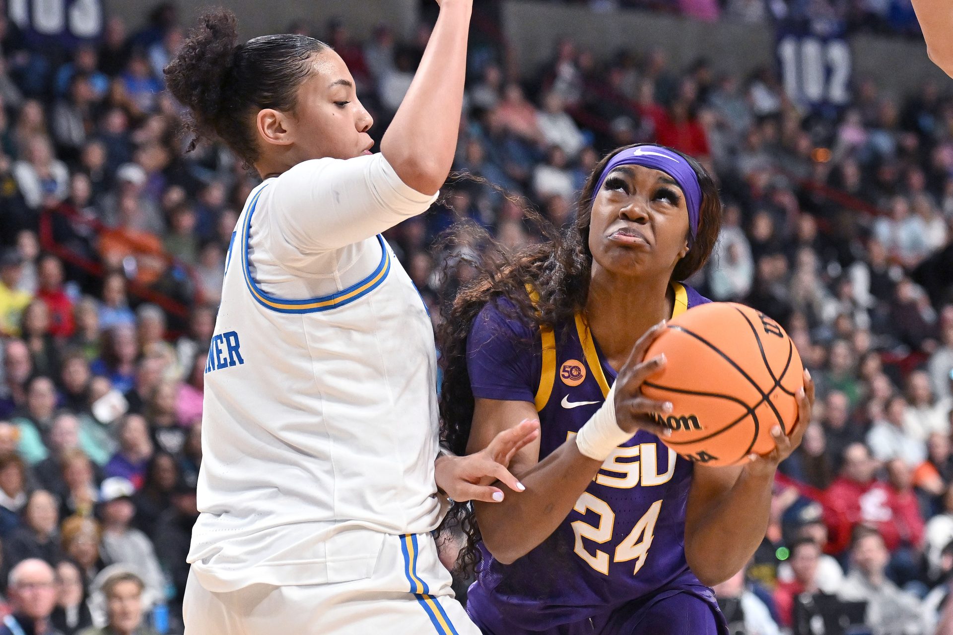 LSU Lady Tigers forward Aneesah Morrow (24) shoots against UCLA Bruins forward Timea Gardiner (30) during the second half of a Elite 8 NCAA Tournament basketball game at Spokane Arena.