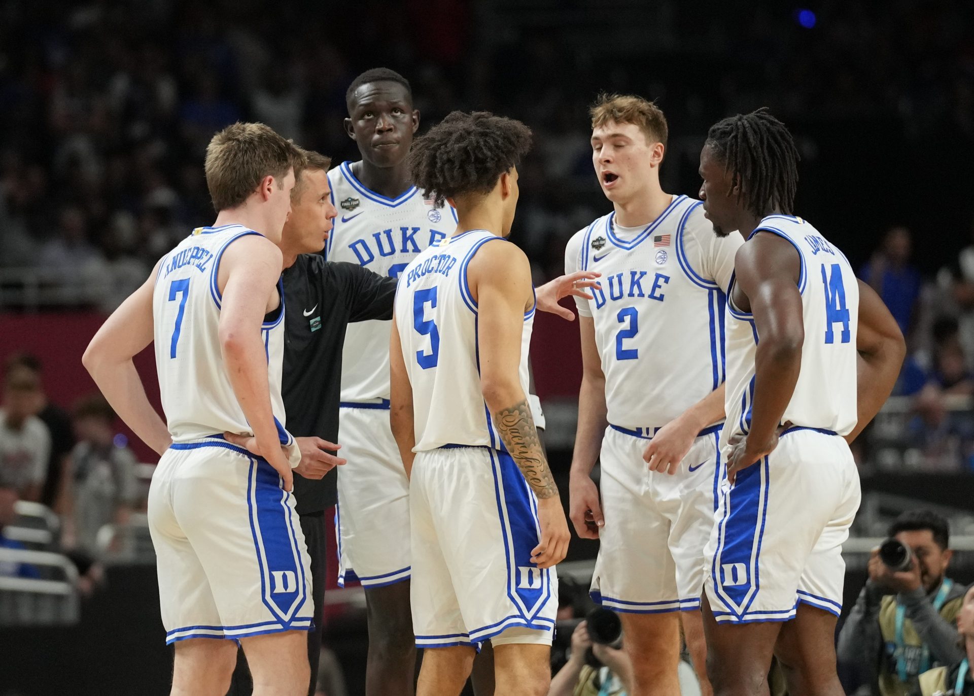 Duke Blue Devils head coach Jon Scheyer huddles with his players against the Houston Cougars in the semifinals of the men's Final Four of the 2025 NCAA Tournament at the Alamodome.