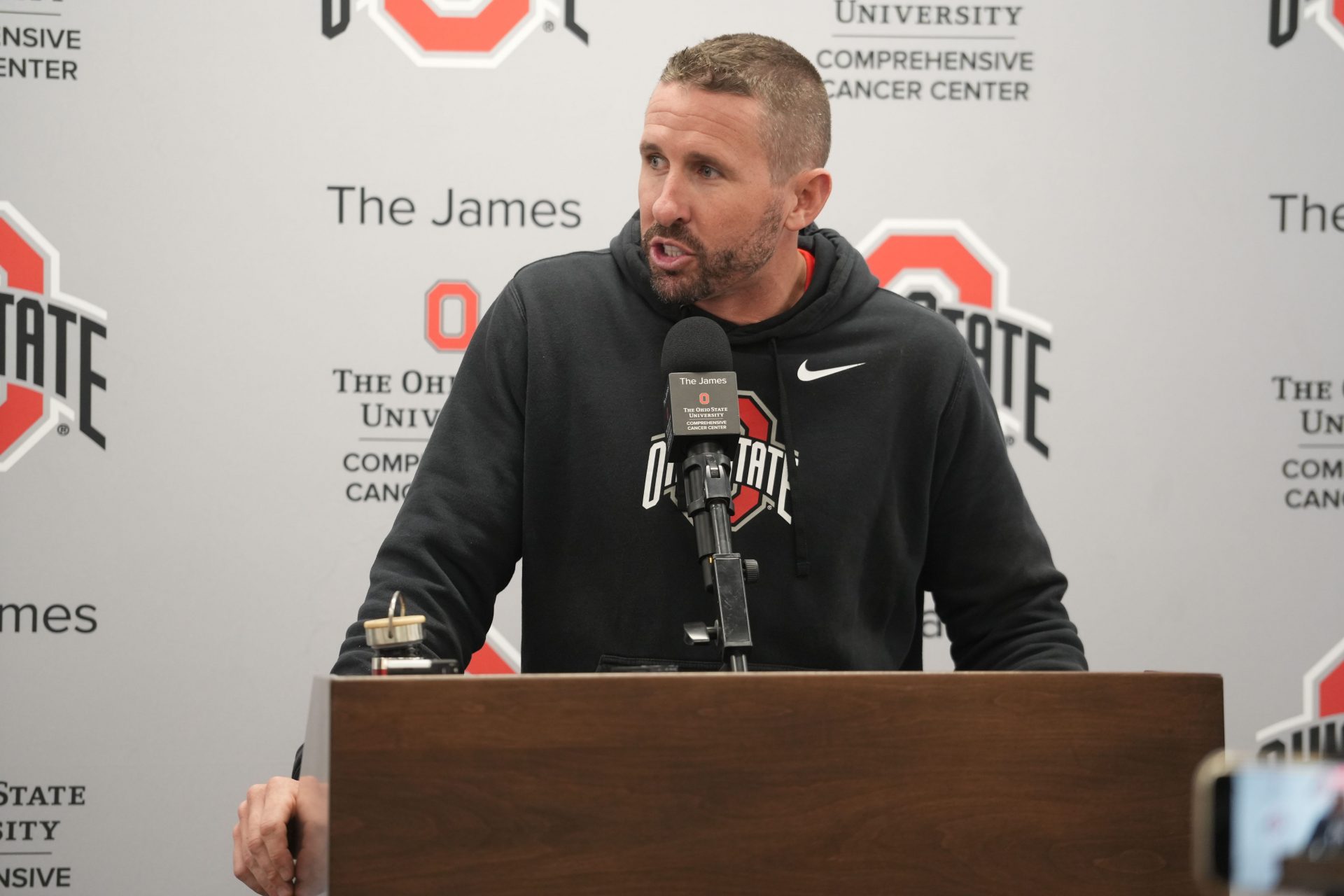 Ohio State Football offensive coordinator Brian Hartline talks during an April 7, 2025 news conference at the Woody Hayes Athletic Center.