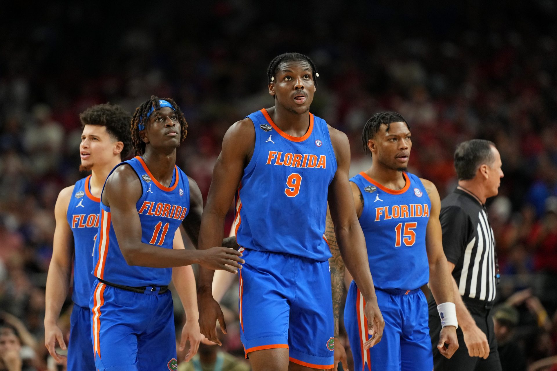 Florida Gators guard Denzel Aberdeen (11) and center Rueben Chinyelu (9) react after a play against the Houston Cougars during the second half of the national championship game of the Final Four of the 2025 NCAA Tournament at the Alamodome.