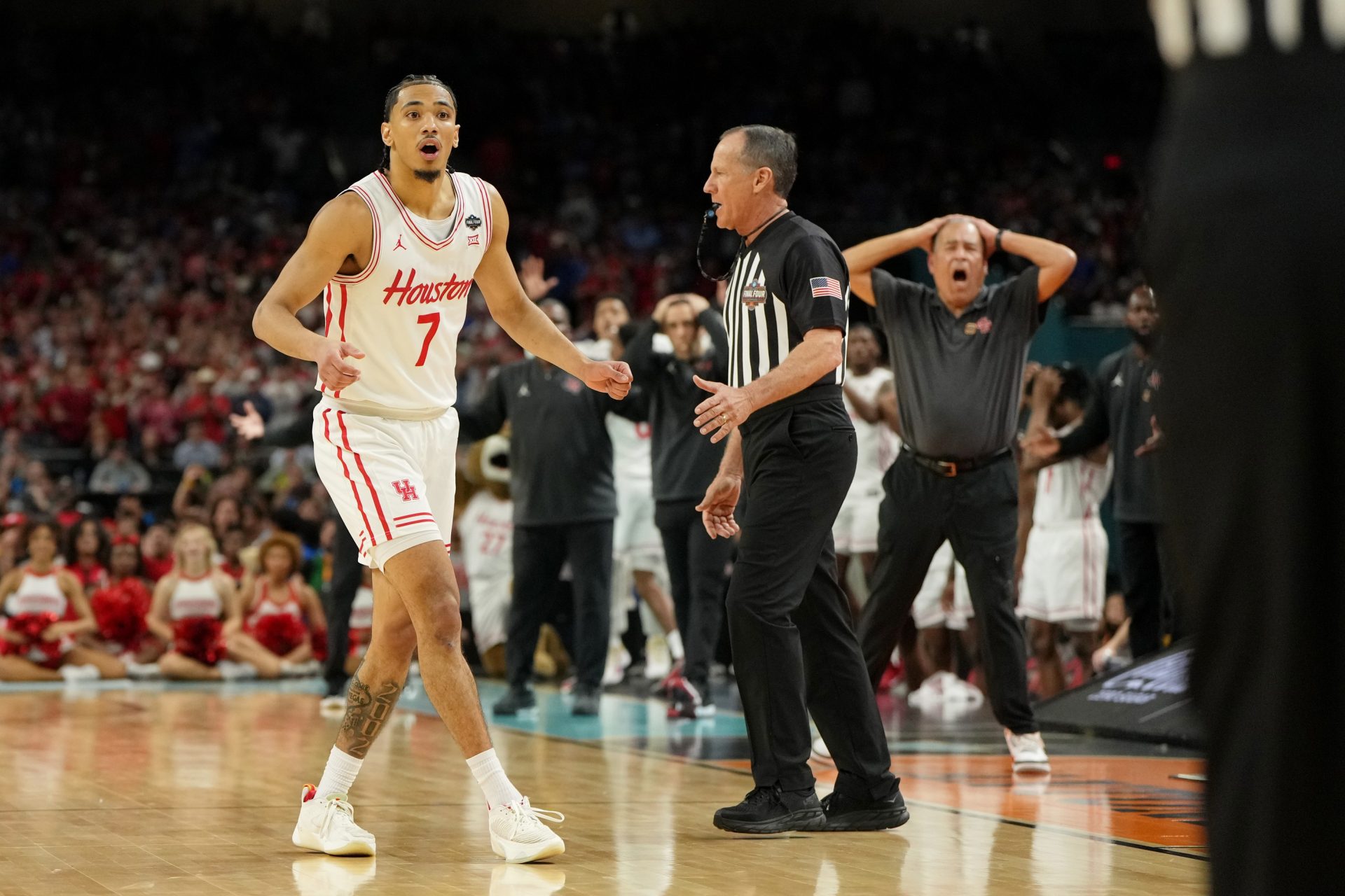 Houston Cougars guard Milos Uzan (7) and head coach Kelvin Sampson reacts after a play against the Florida Gators during the second half of the national championship game of the Final Four of the 2025 NCAA Tournament at the Alamodome.