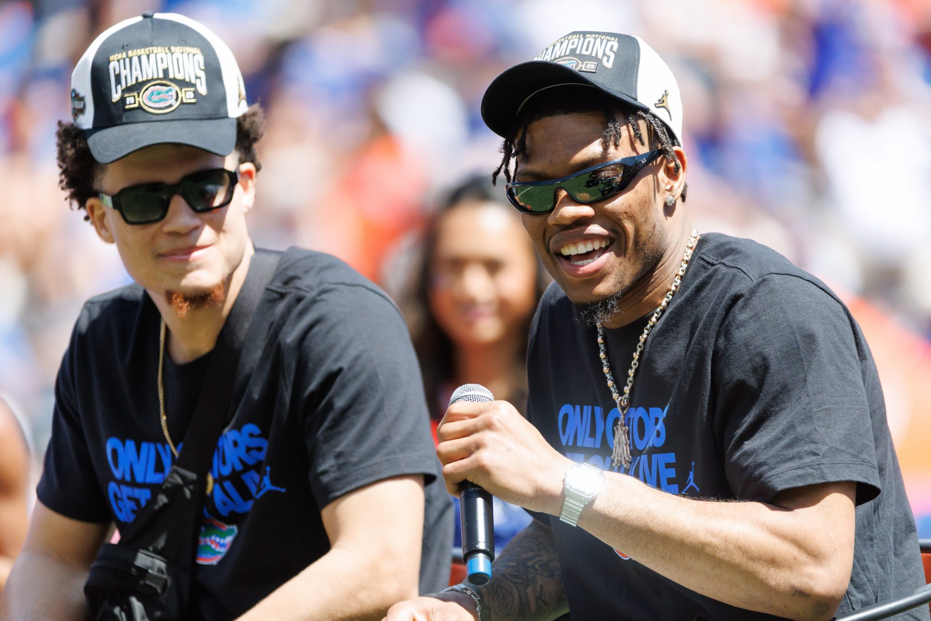 Florida Gators guard Alijah Martin (15) smiles while Florida Gators guard Walter Clayton Jr. (1) listens during the National Championship celebration at Ben Hill Griffin Stadium.