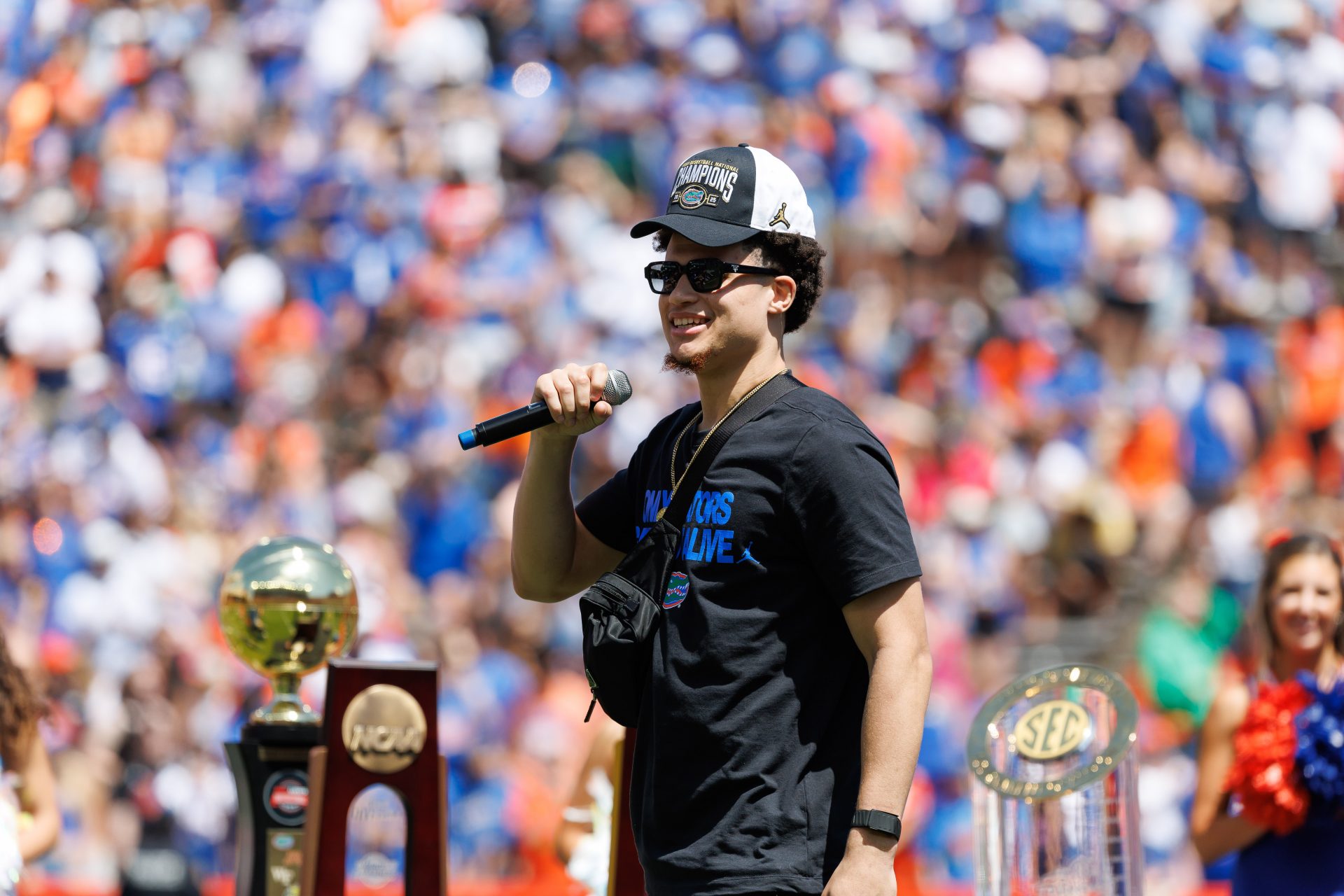 Florida Gators guard Walter Clayton Jr. (1) addresses the crowd during the National Championship celebration at Ben Hill Griffin Stadium.