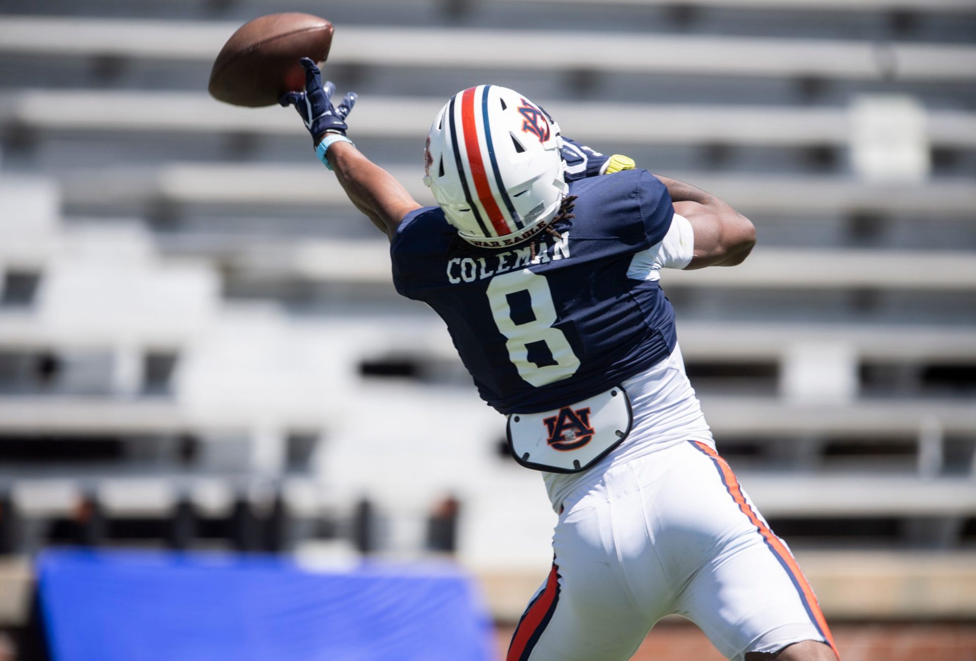 A pass sails over the reach of Auburn Tigers wide receiver Cam Coleman (8) during Auburn Tigers A-Day football practice at Jordan-Hare Stadium in Auburn, Ala., on Saturday, April 12, 2025.