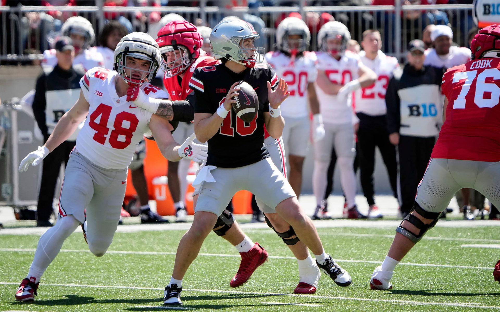Ohio State Buckeye Scarlet Julian Sayin (10) drops back to pass the ball against team Gary defense in the 1st half during the spring game at Ohio Stadium on April 12, 2025.