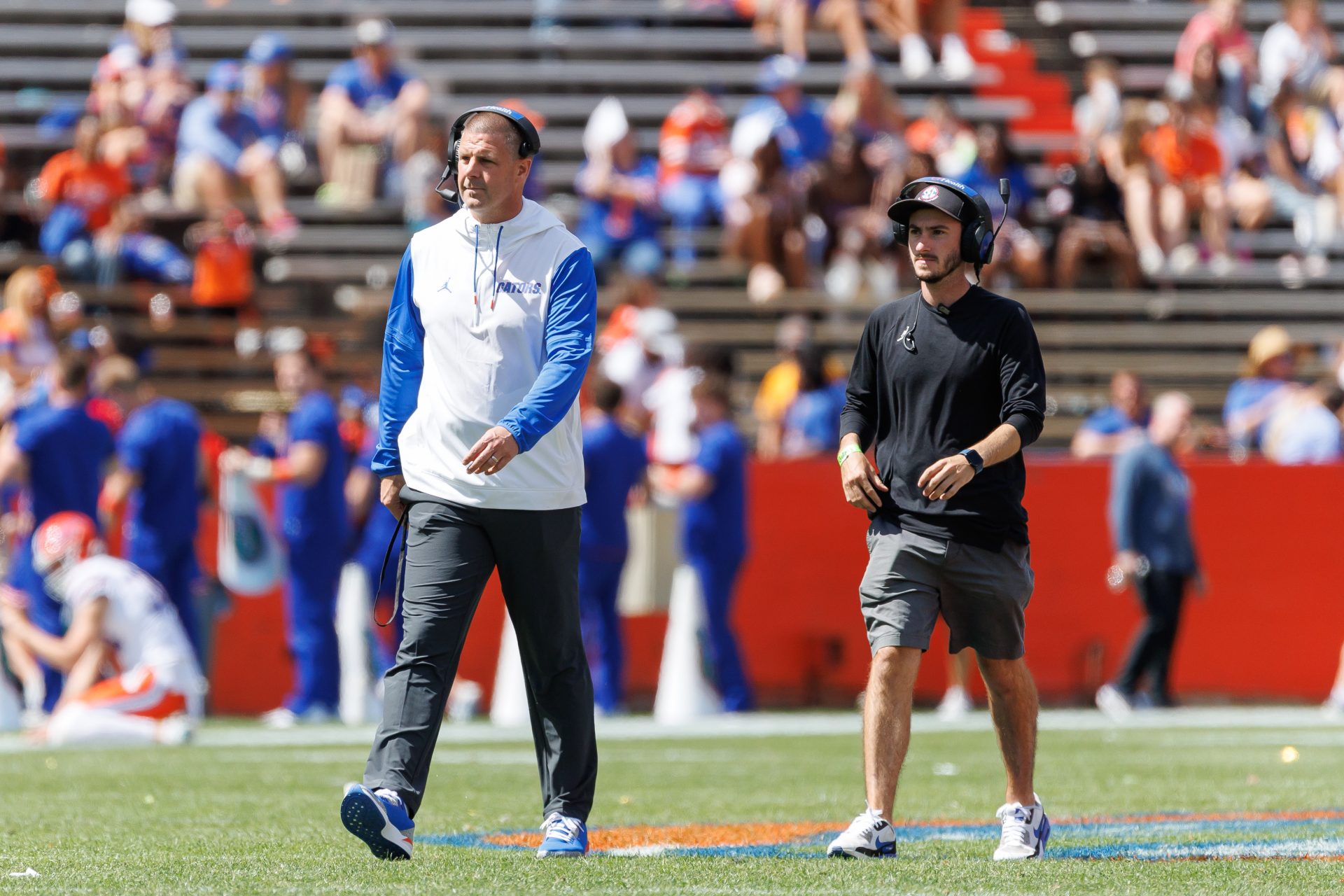 Florida Gators head coach Billy Napier walks on the field during the second half at Ben Hill Griffin Stadium.