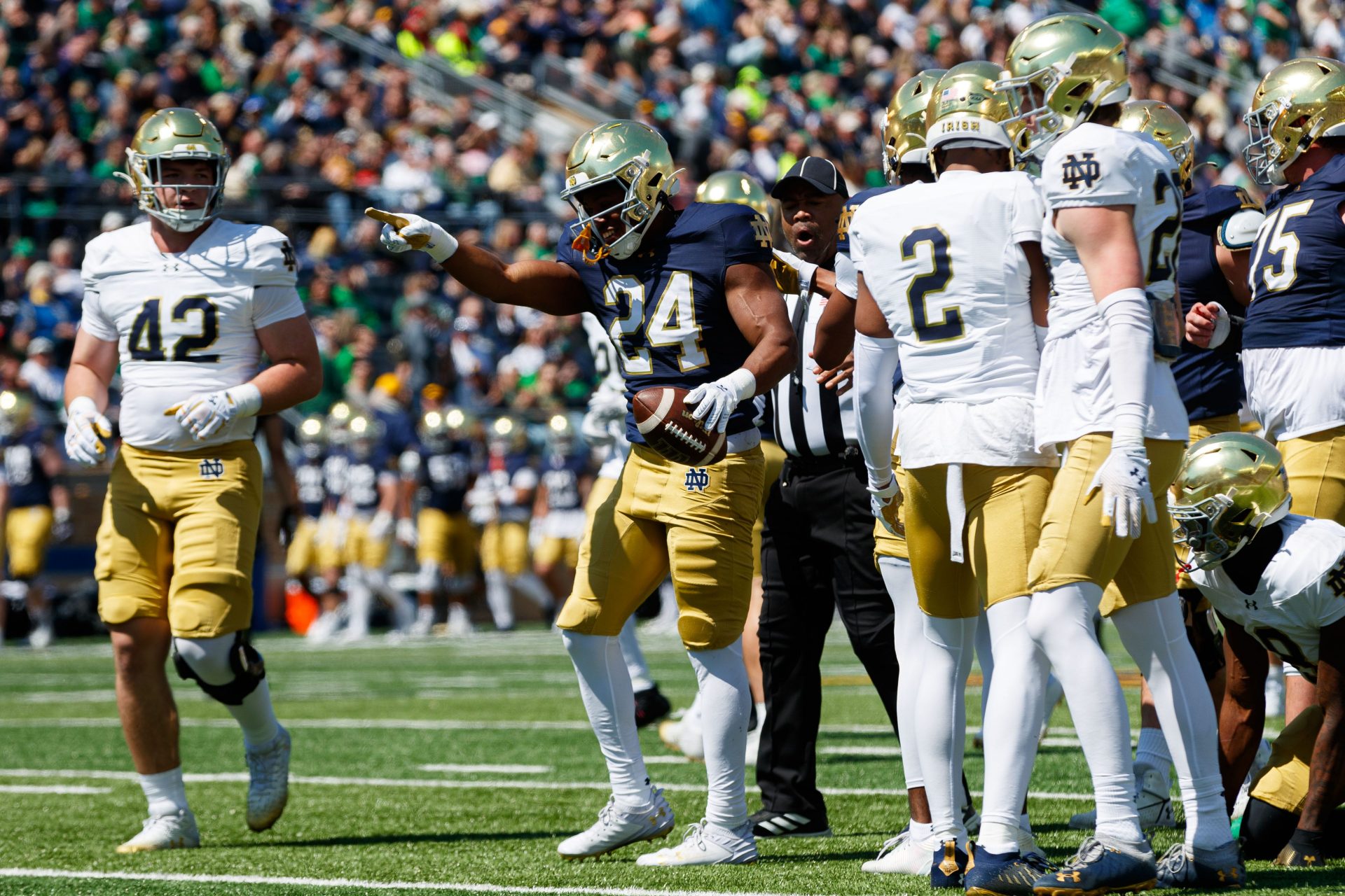 Notre Dame running back Jadarian Price (24) celebrates getting a first down during the Notre Dame Blue-Gold spring football game at Notre Dame Stadium on Saturday, April 12, 2025, in South Bend.