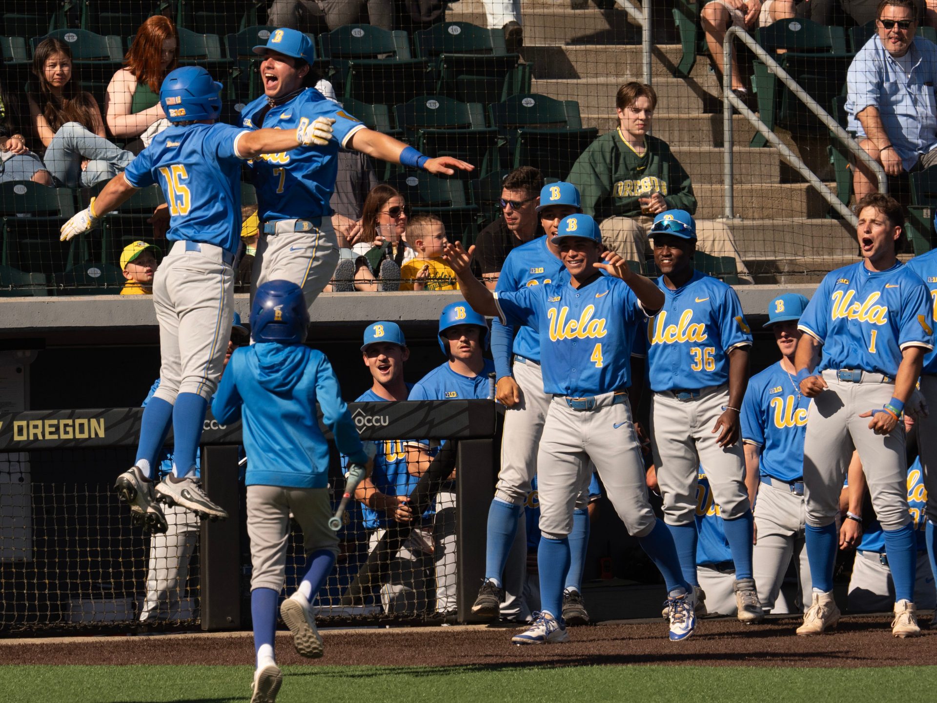 UCLA players celebrates as they break out the bats in the 7th inning to defeat the Oregon Ducks at PK Park in Eugene