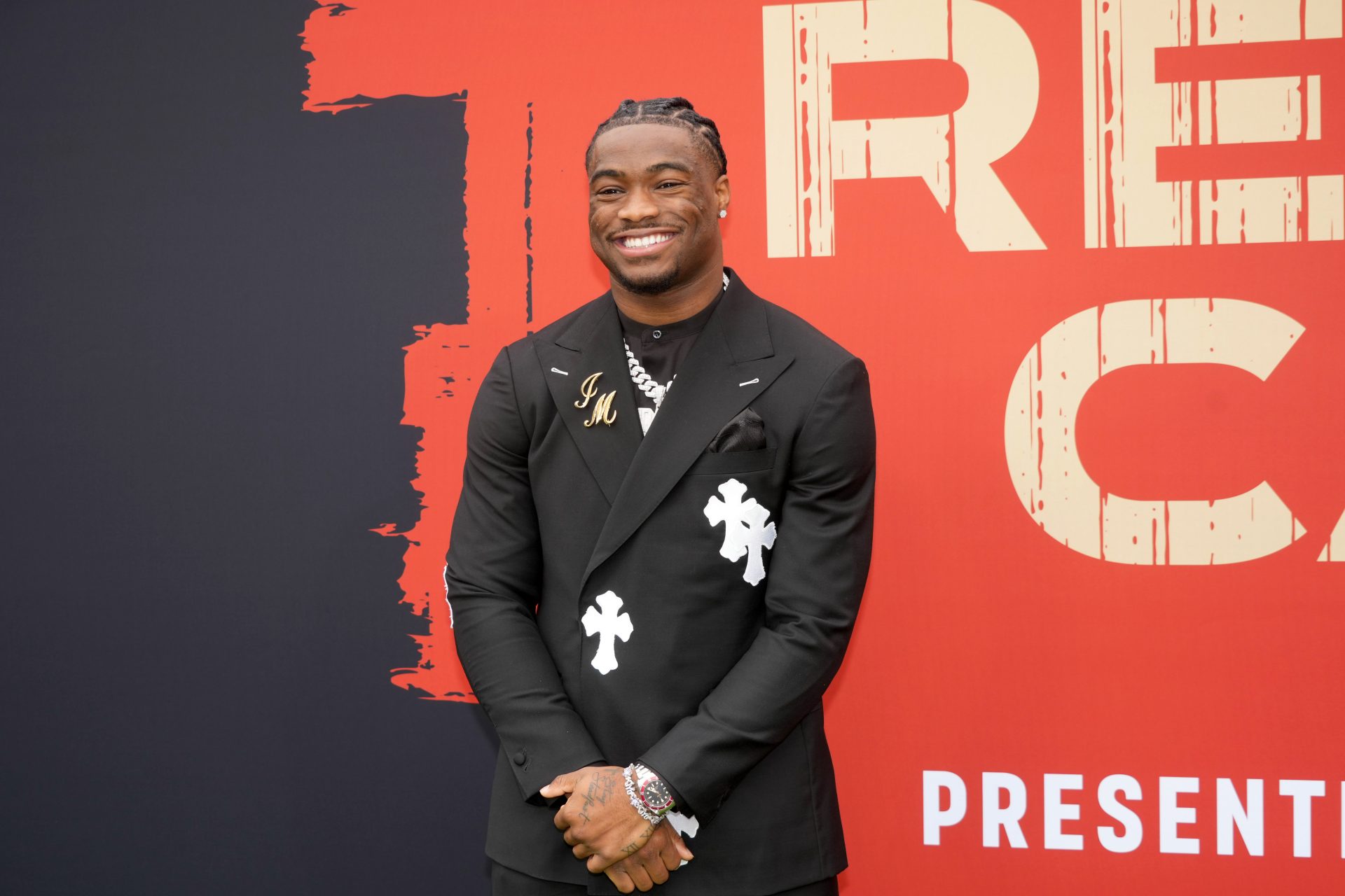 Alabama Crimson Tide quarterback Jalen Milroe on the red carpet before the 2025 NFL Draft at Lambeau Field.