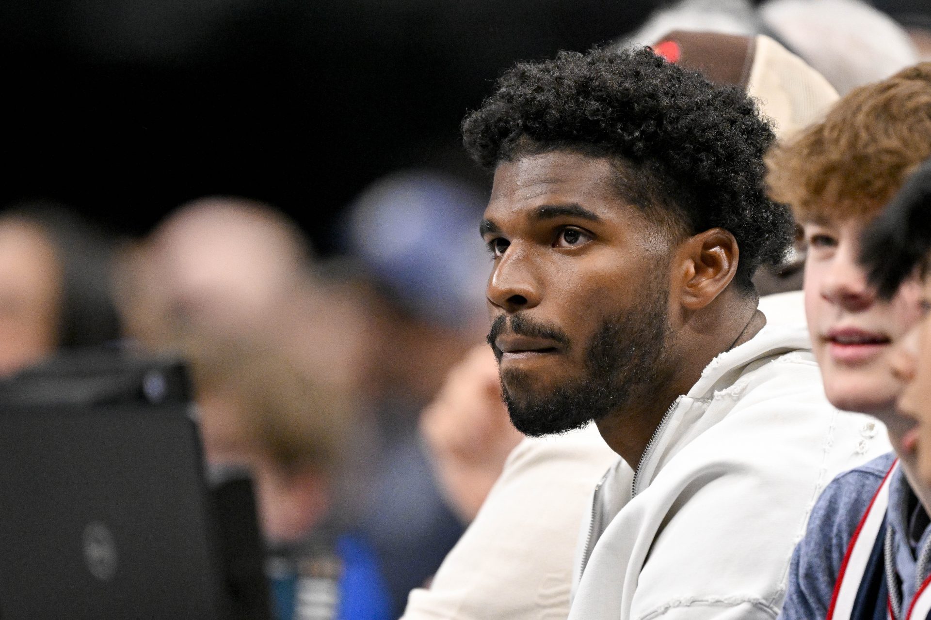 Colorado Buffaloes quarterback Shedeur Sanders looks on during the game between the Dallas Mavericks and the Denver Nuggets in the second quarter at the American Airlines Center.