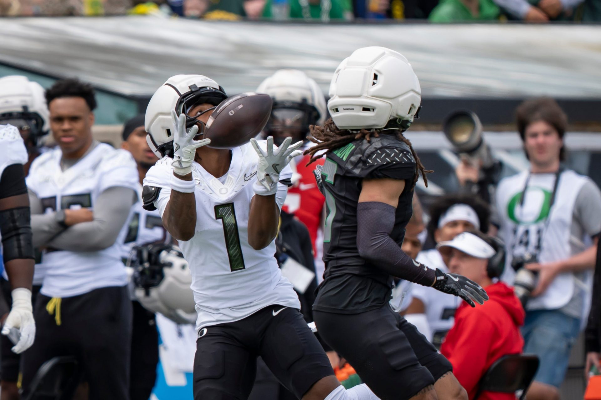Fighting Ducks wide receiver Dakorien Moore catches a pass as the Fighting Ducks face off against Mighty Oregon in the Oregon Ducks spring game on April 26, 2025, at Autzen Stadium in Eugene.