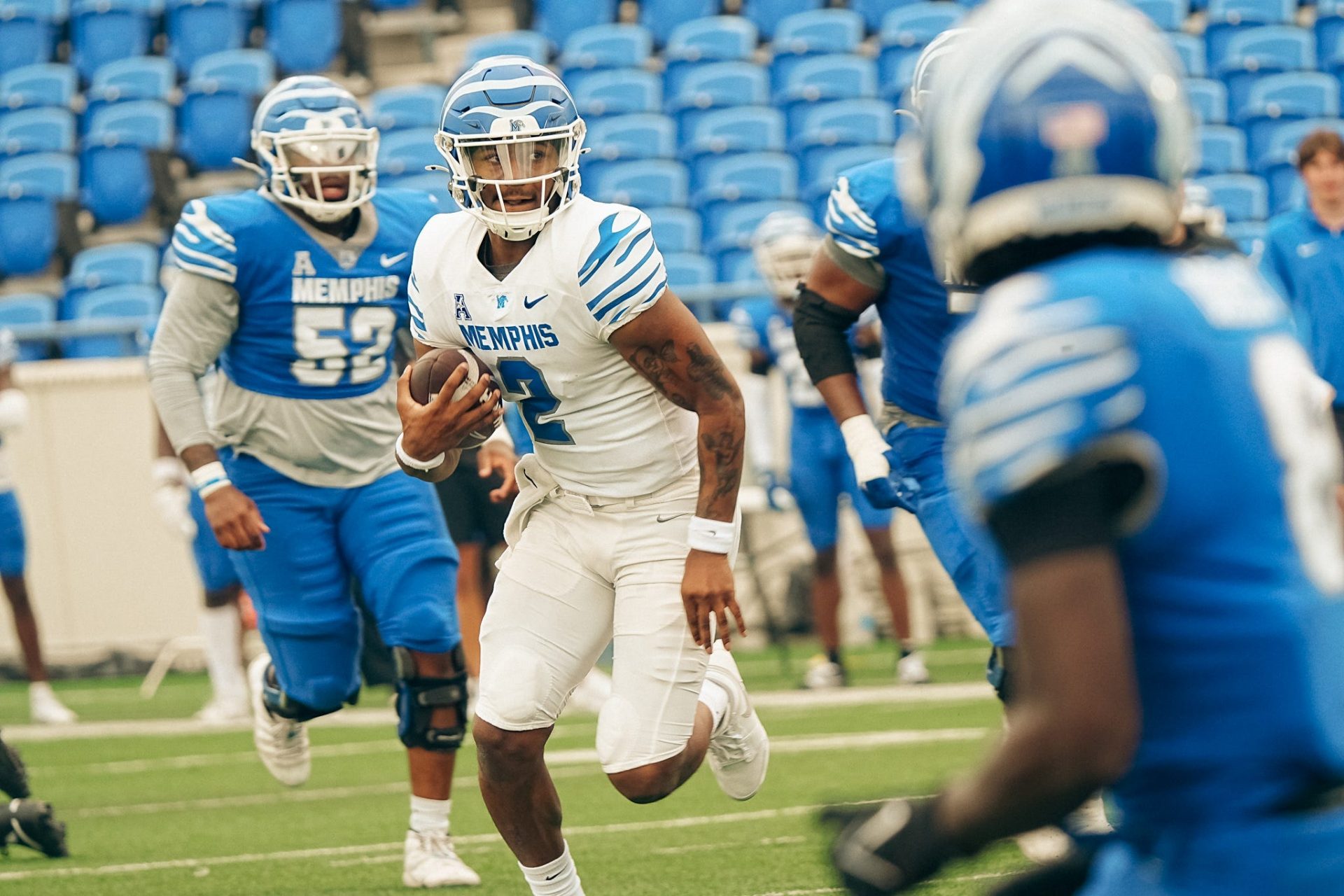 Quarterback Brendon Lewis (2) rushes with the ball during a Memphis Tigers football spring game between the blue and gray team on Saturday, April 26, 2025 at Simmons Liberty Bank Stadium in Memphis, Tenn.